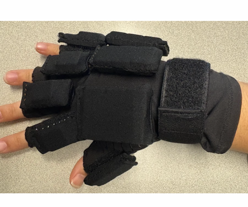 Weighted Compression Glove for Reducing Hand Tremors