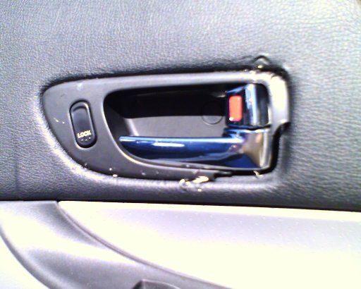 Replacing a Mazda 6 Plastic Thing That Goes Around the Door Handle
