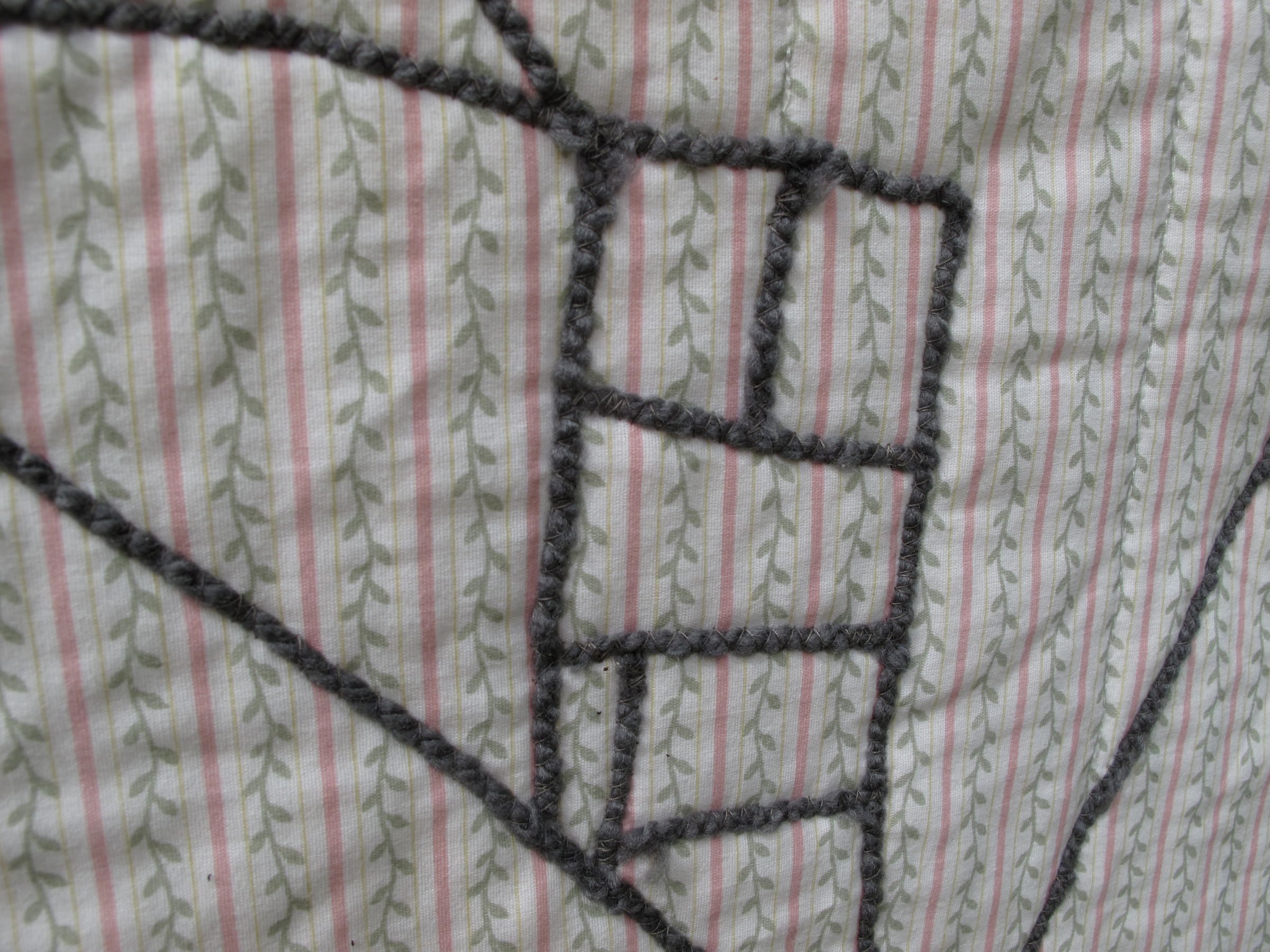 "Drawing" on fabric with yarn (aka couching)