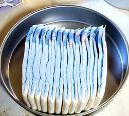 Place Diapers in Sturdy Cake Pan