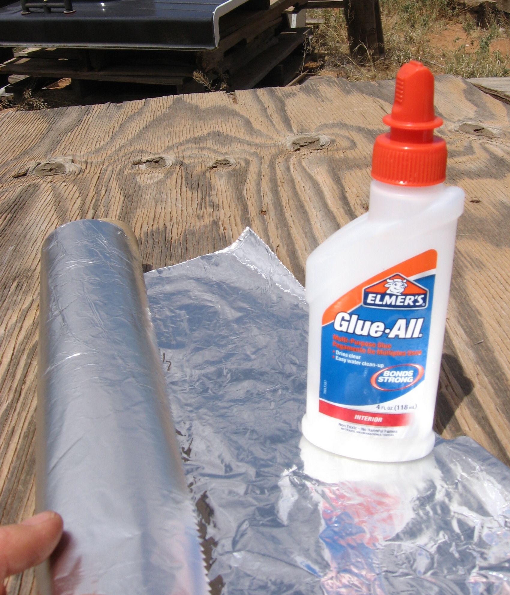 Cardboard. Foil. Glue the Solar Funnel Cooker 8 Steps (with Pictures