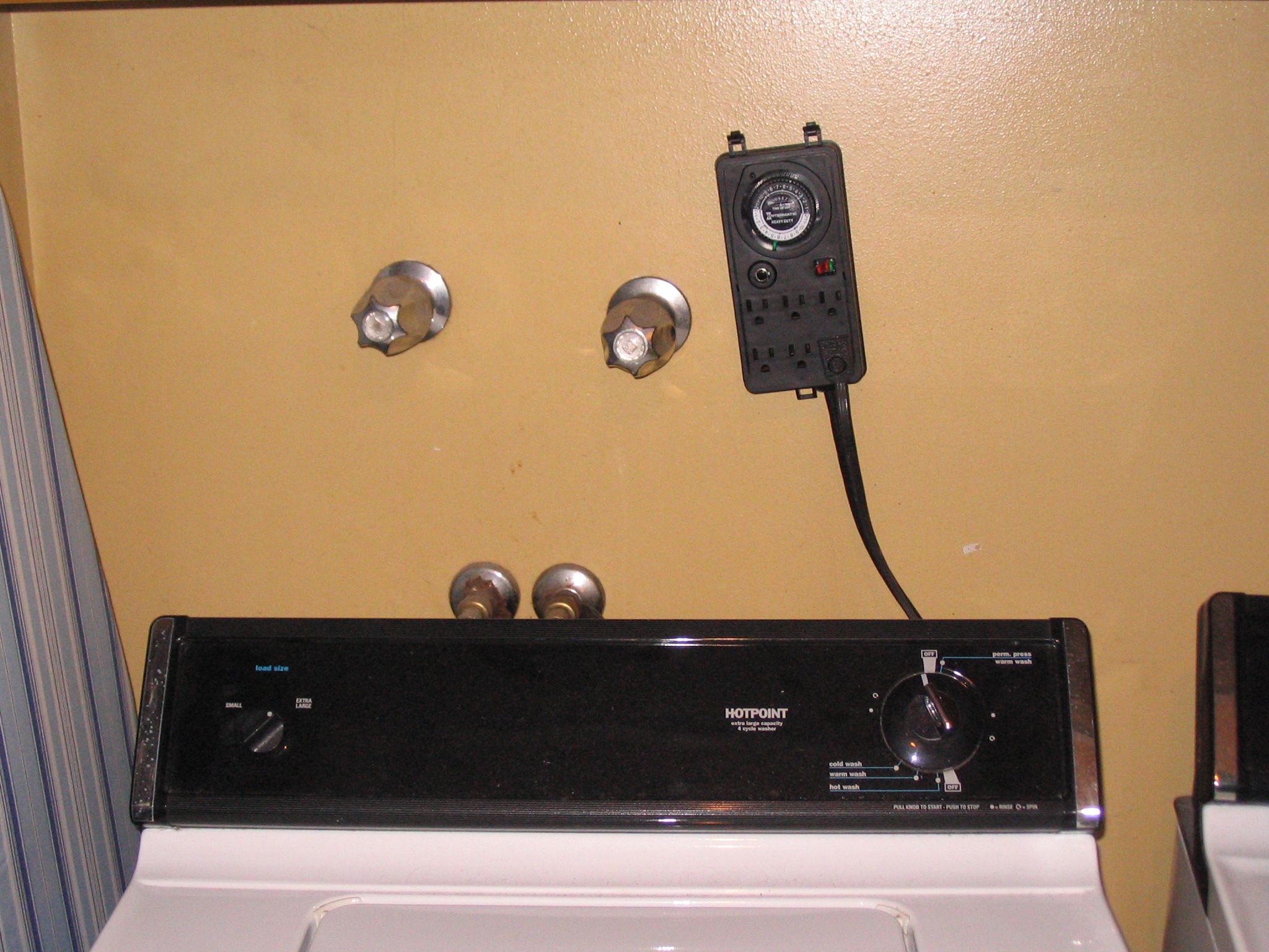 Use a Timer on Your Washing Machine to Wash Clothes While You Are Gone  