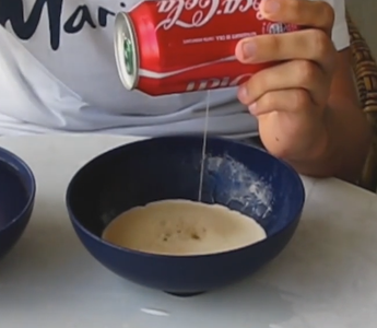 Pierce the Can to Make a Tiny Hole and Spill the Liquid in the Empty Recipient