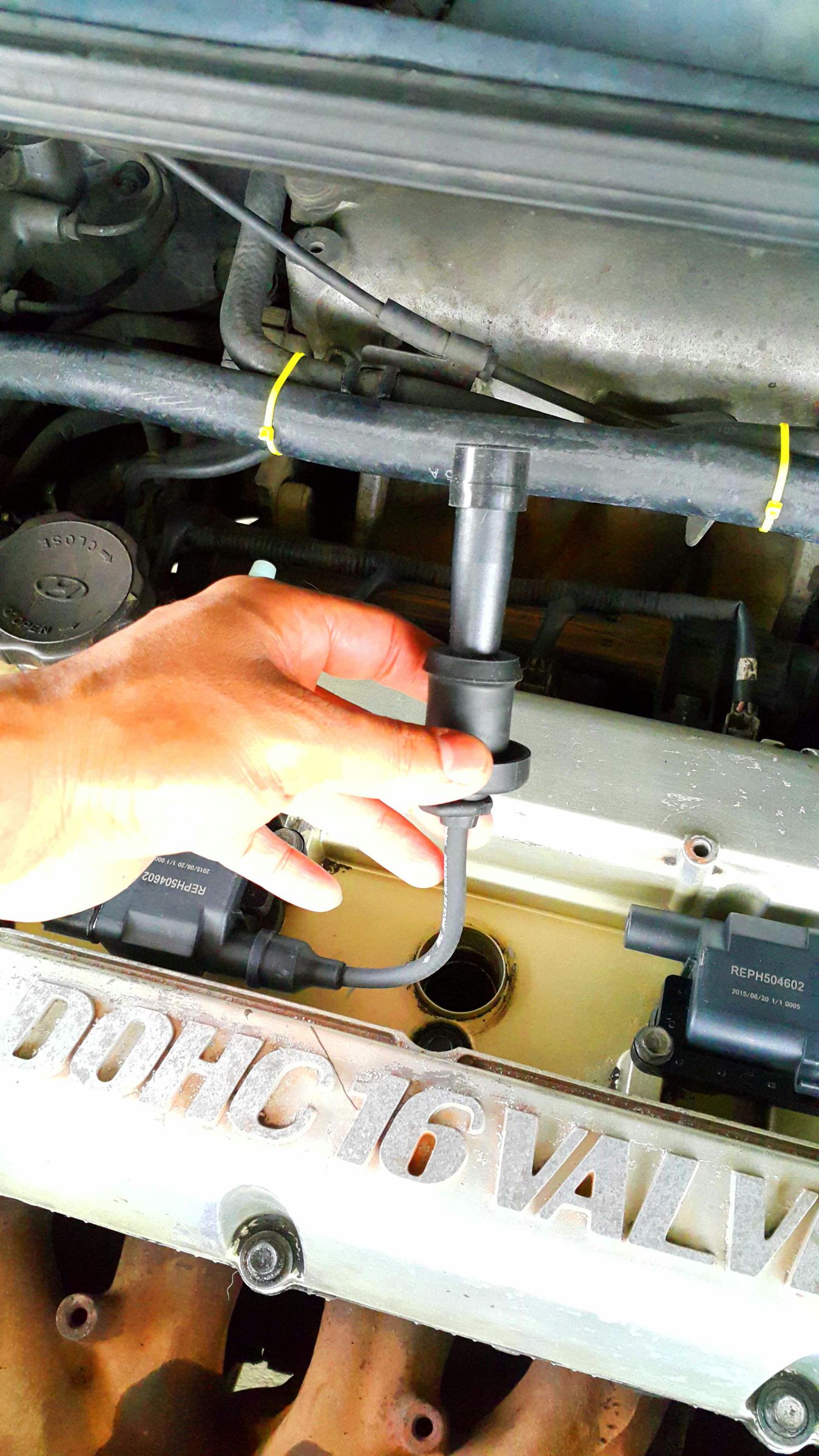 Replacing Coil Packs and Spark Plug Wires for Hyundai Trajet 2000. 3