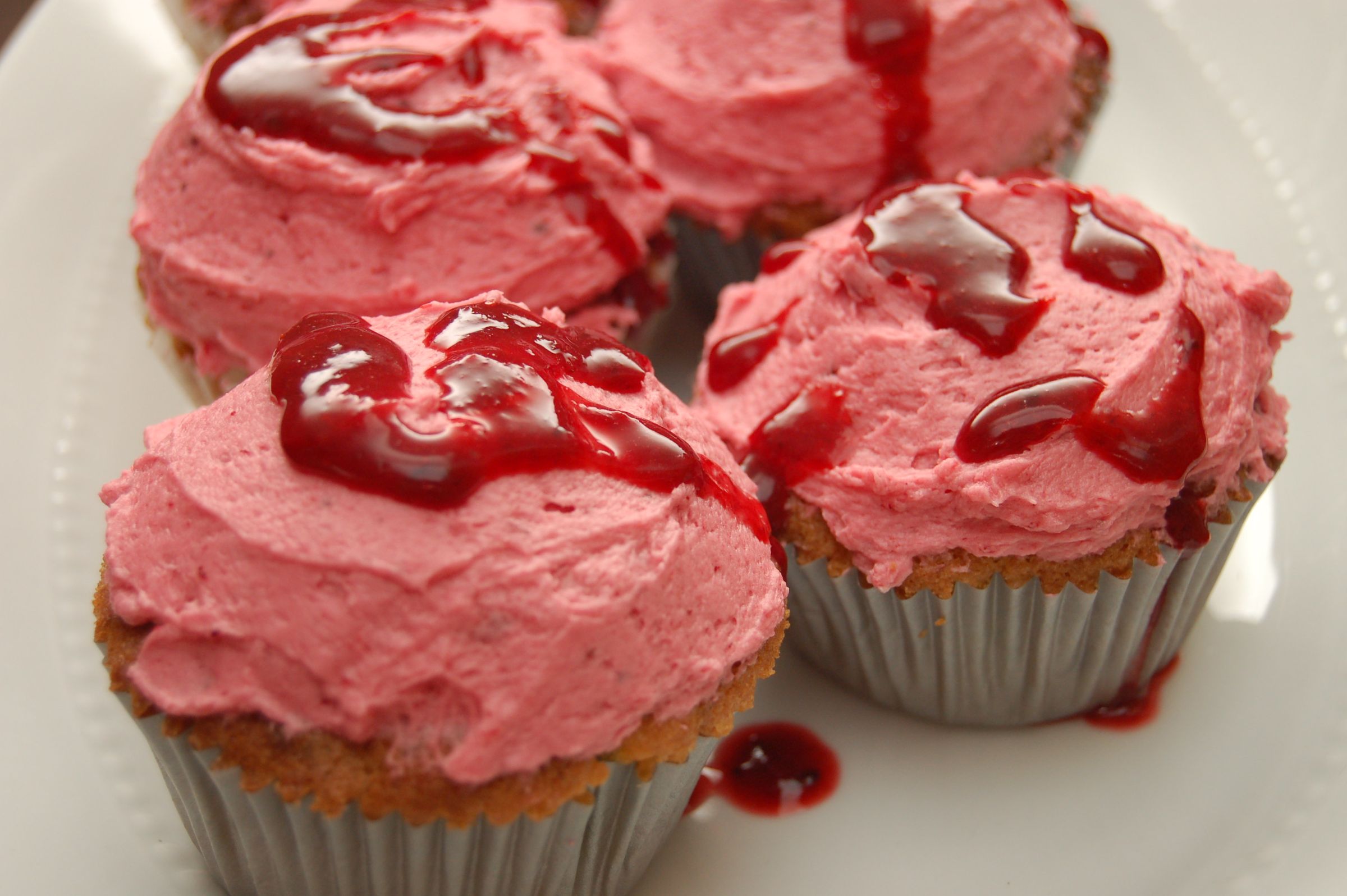 White Chocolate and Macadamia Cupcakes With Berry Frosting