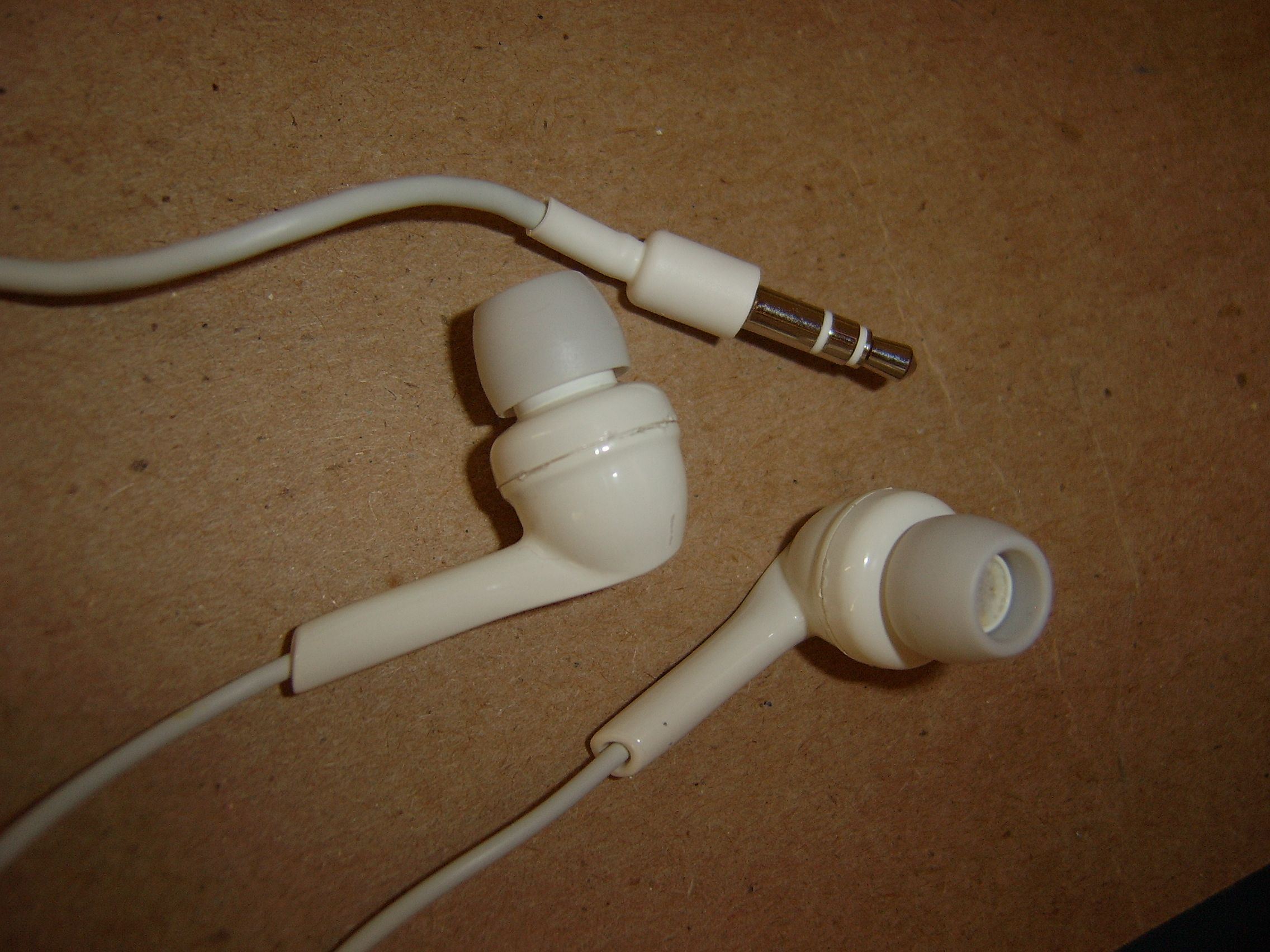 Swap in  iPod wire into aftermarket earphones.