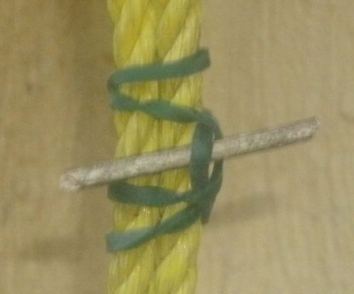 a rubber band and stick holding trick DIY Project DIY Project Image