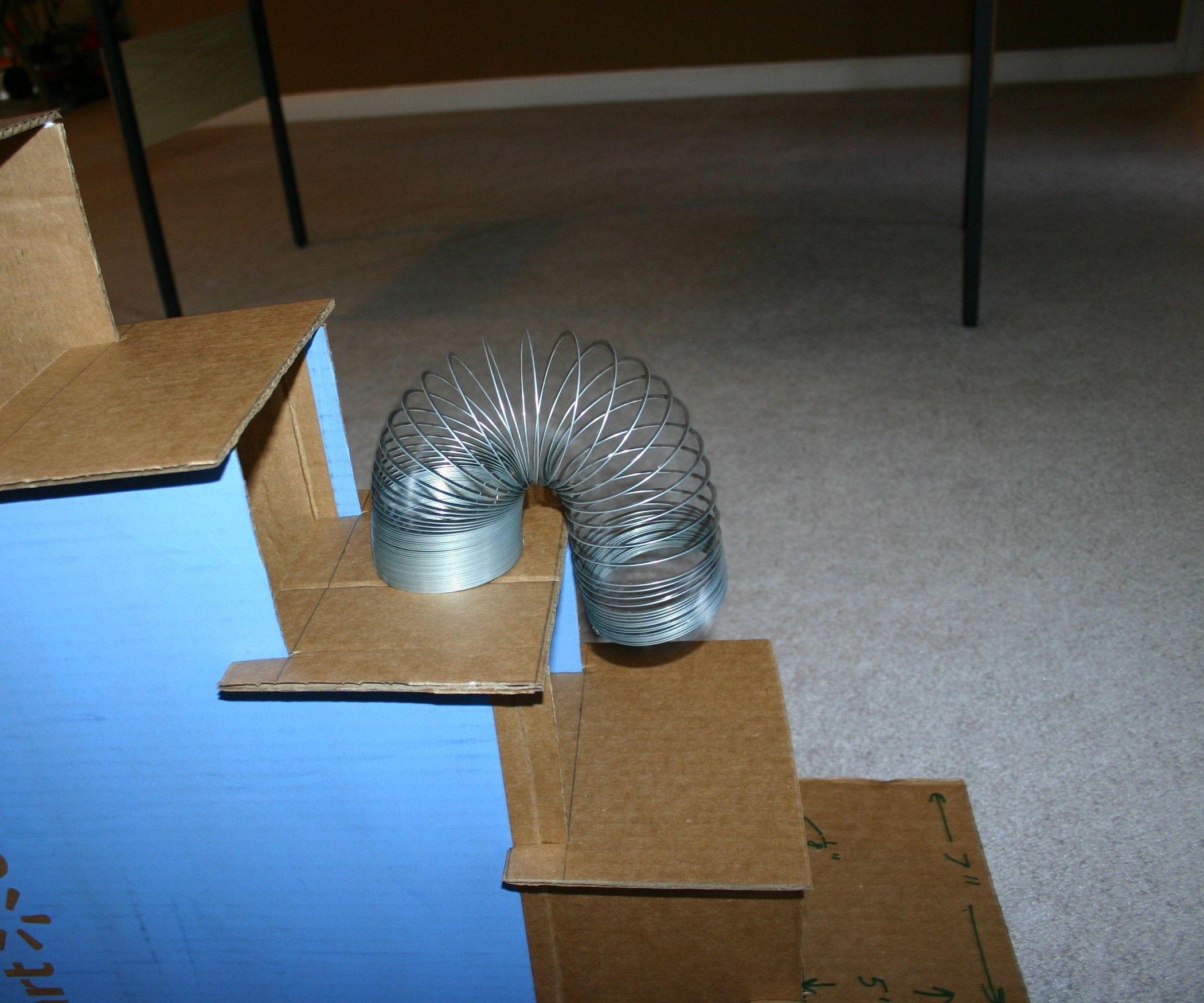 Top 100+ Images how to make a slinky walk down stairs Latest