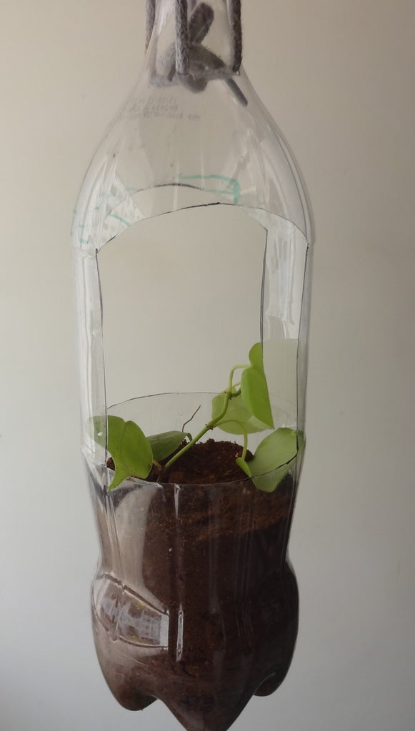 Upcycling A Bottle Into Hanging Pot 4 Steps With Pictures Instructables - Wall Hanging Flower Vase With Plastic Bottle Upcycling A Bottle Into Hanging Pot 4 Steps With Pictures Instructables - Wall Hanging Flower Vase With Plastic Bottle