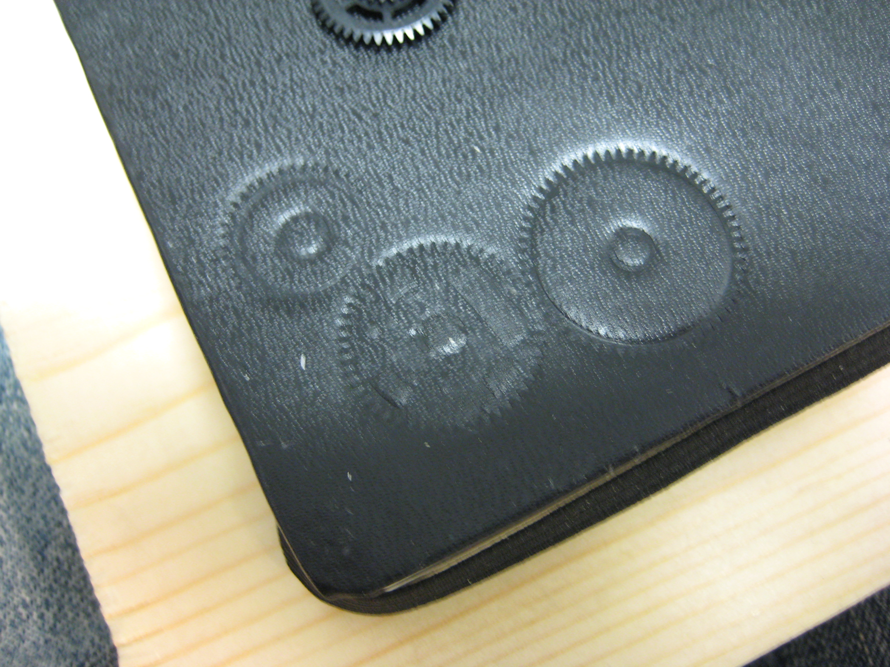 Embossing a Moleskin With Gears 8 Steps Instructables