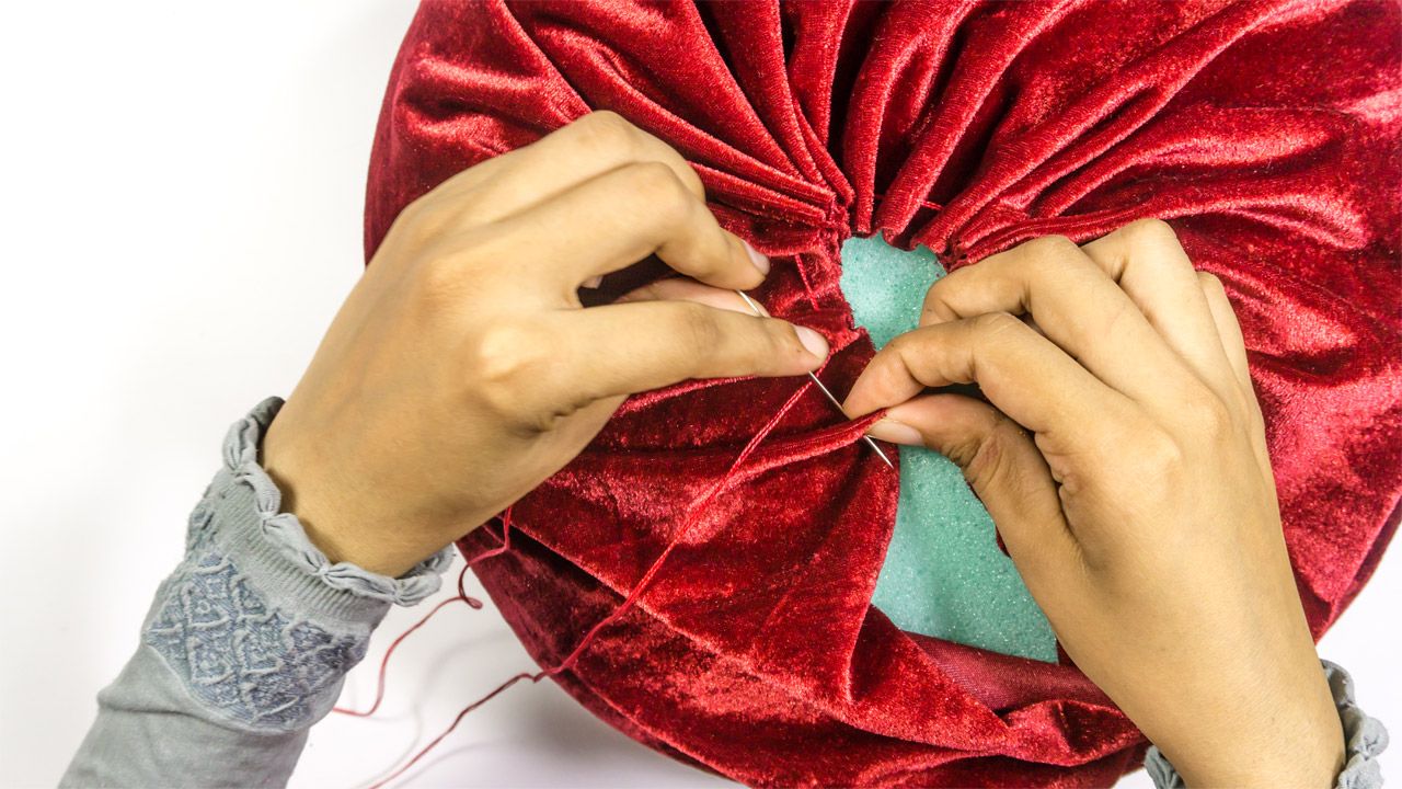 round pleated pillow