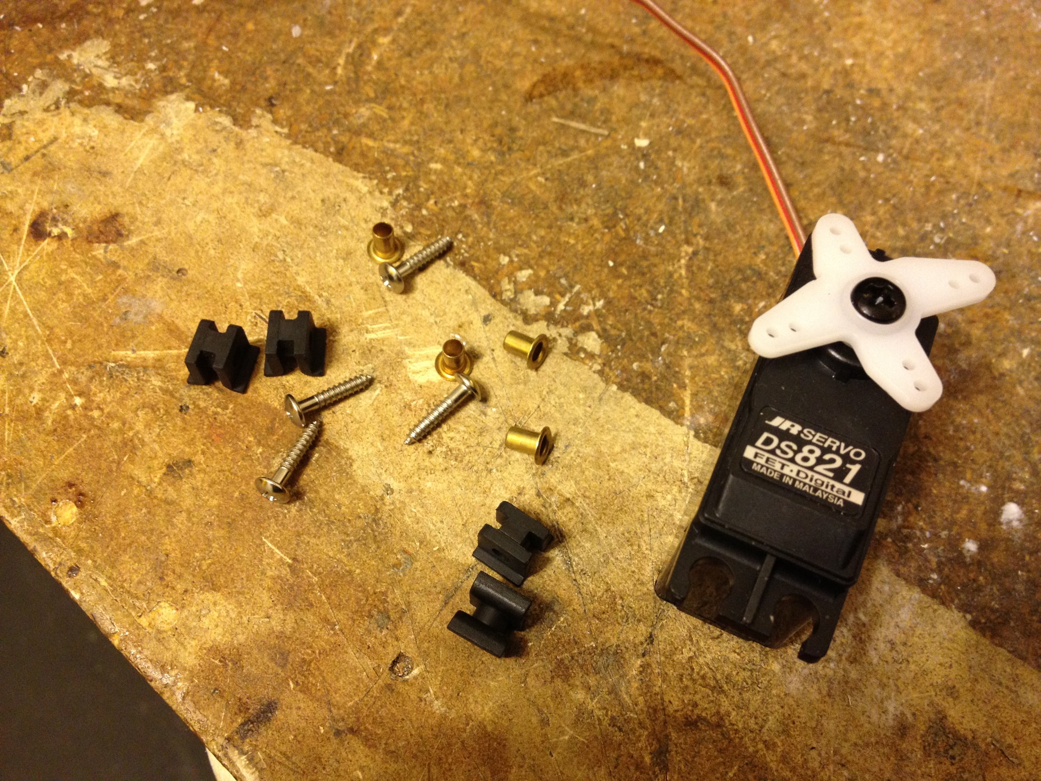 How to Install Those Tiny Little Eyelets in the Grommets on RC Servos