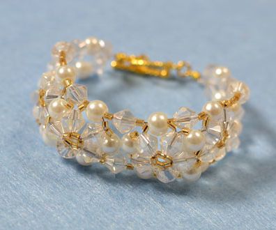 bead bracelet designs to make - how to make a beaded flower bracelet DIY Project DIY Project Image