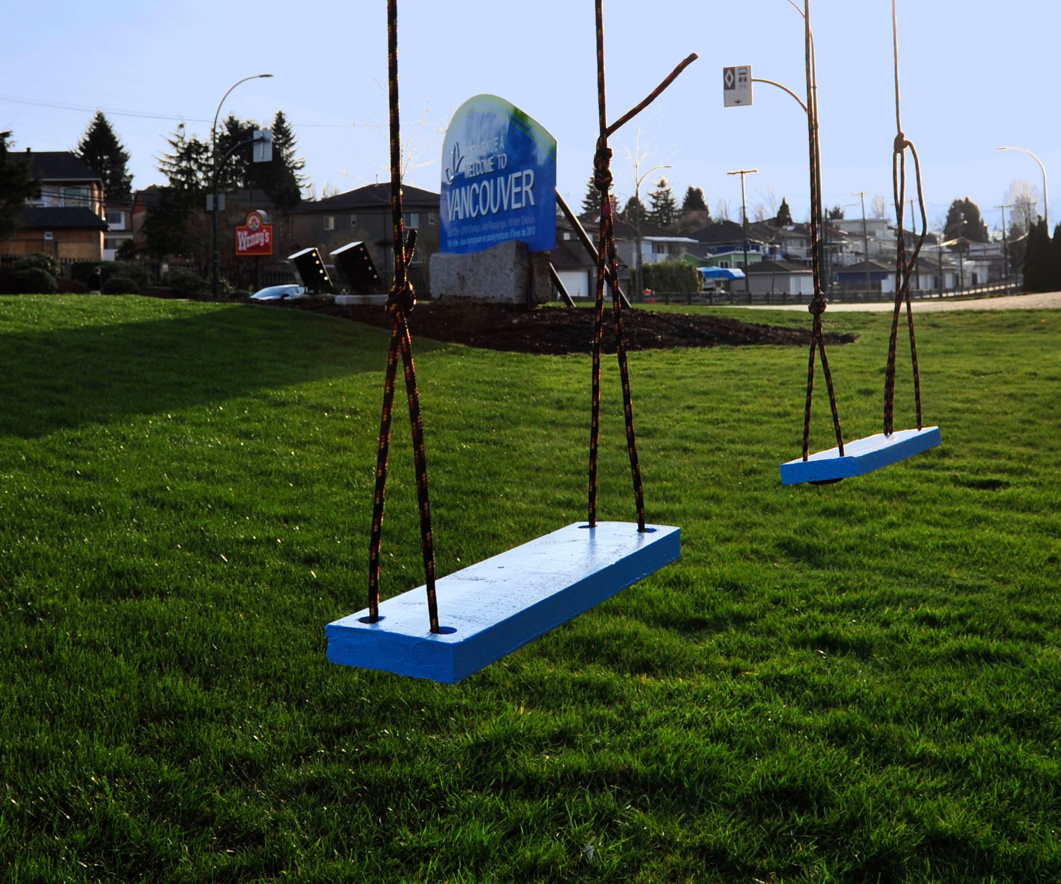 DIY guide for A Swing Set from a Billboard (Using Scrap Lumber) with step-by-step instructions