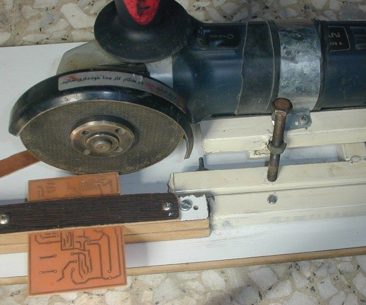 ٍeasy pcb cutter with a grinder on a chasis DIY Project DIY Project Image
