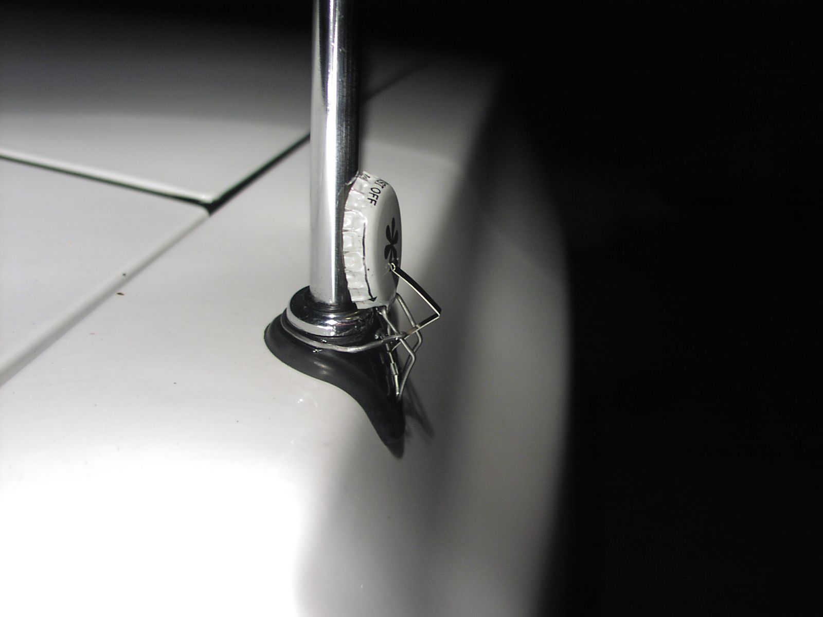 DIY guide for Pop-Bottle-Cap Antenna Protector with step-by-step instructions