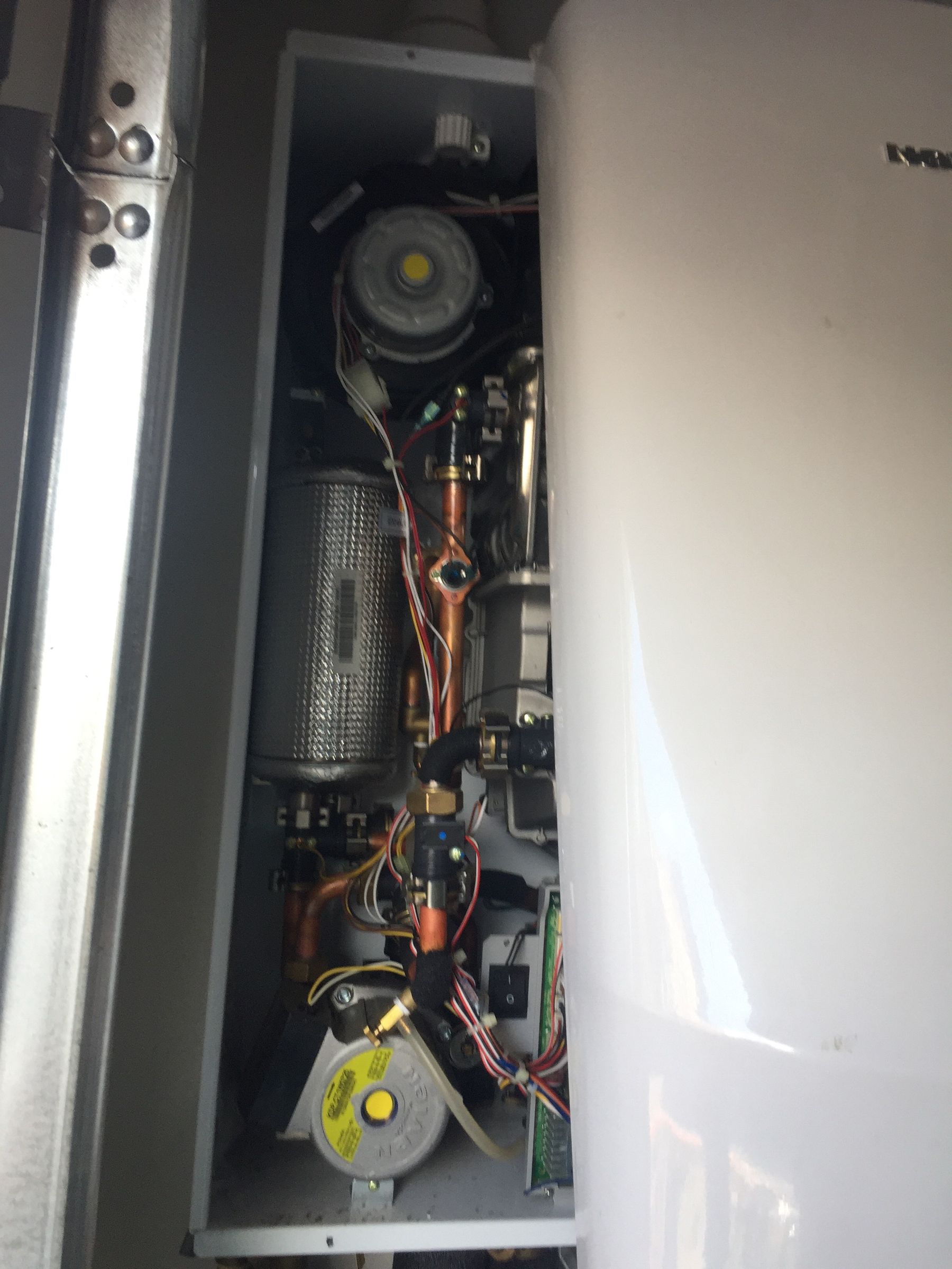 How to Flush a Tankless Water Heater and Clean the Air Intake Filter