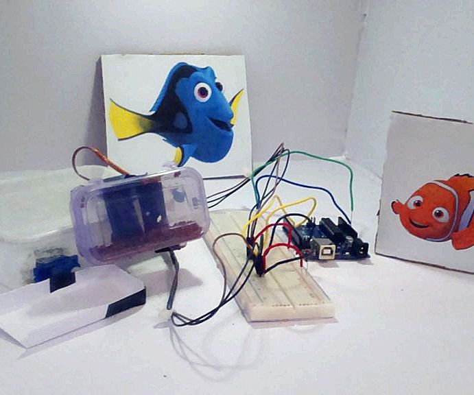 DIY guide for Automatic Fish Food Feeder using Arduino Uno with step-by-step instructions