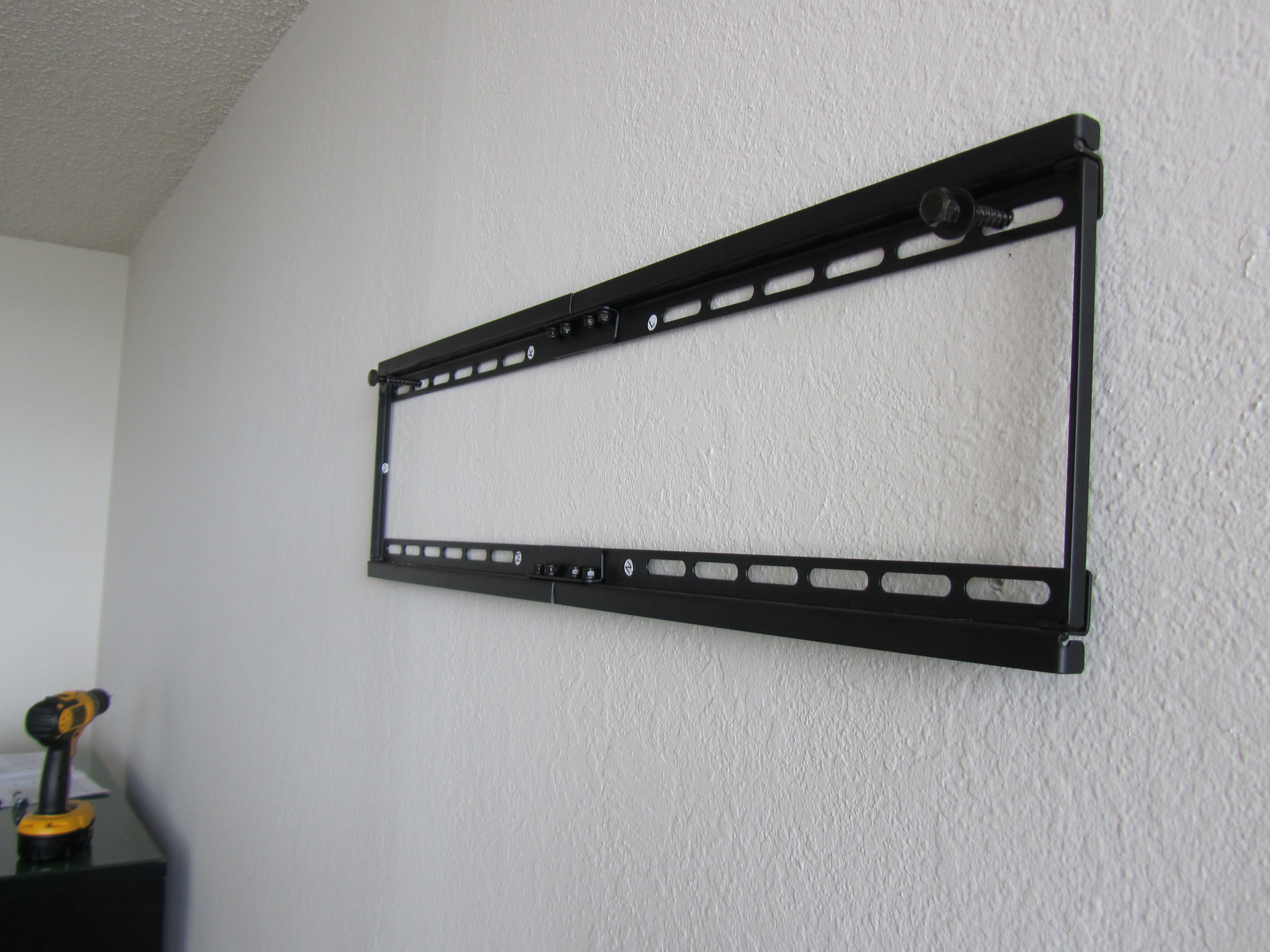 How to Wall Mount a Television (using a Cheetah Mount) 8 Steps (with