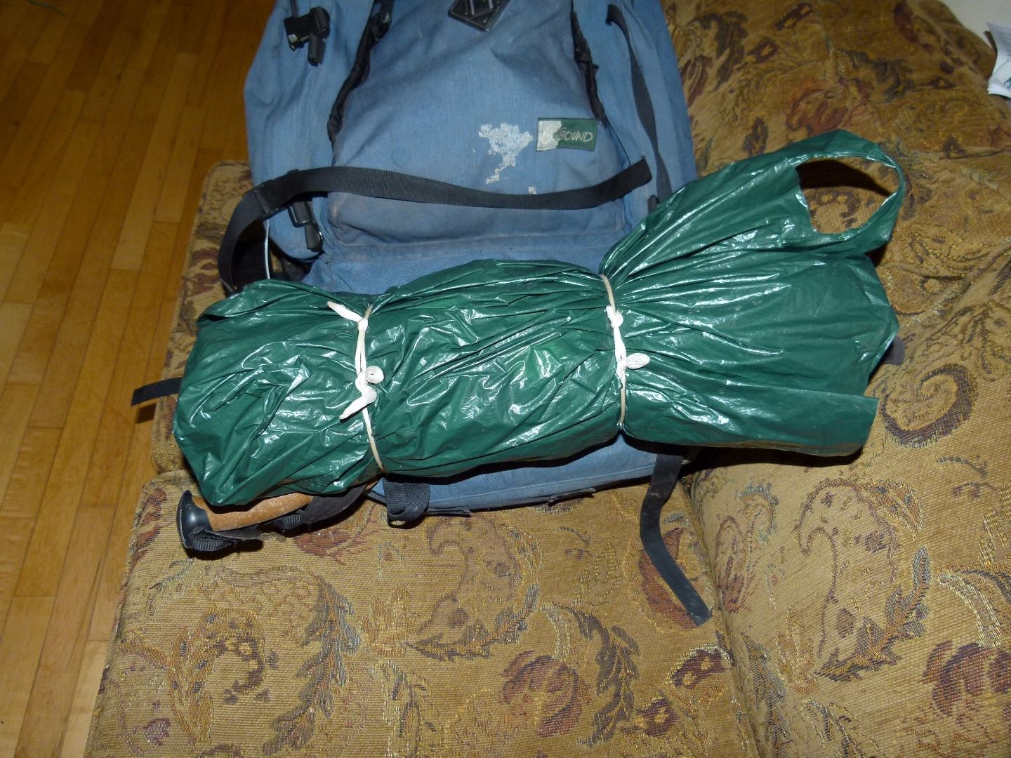 tying sleeping bag to backpack