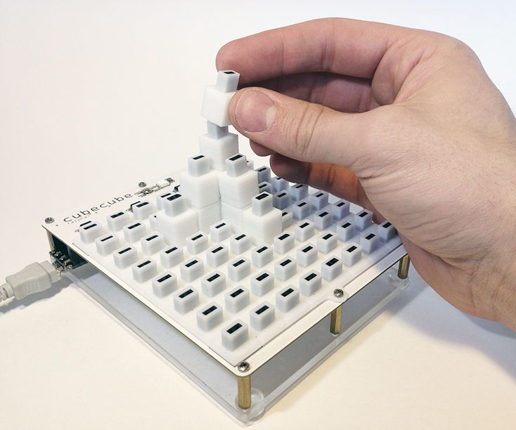 Cubecube: a Tangible CAD Interface.