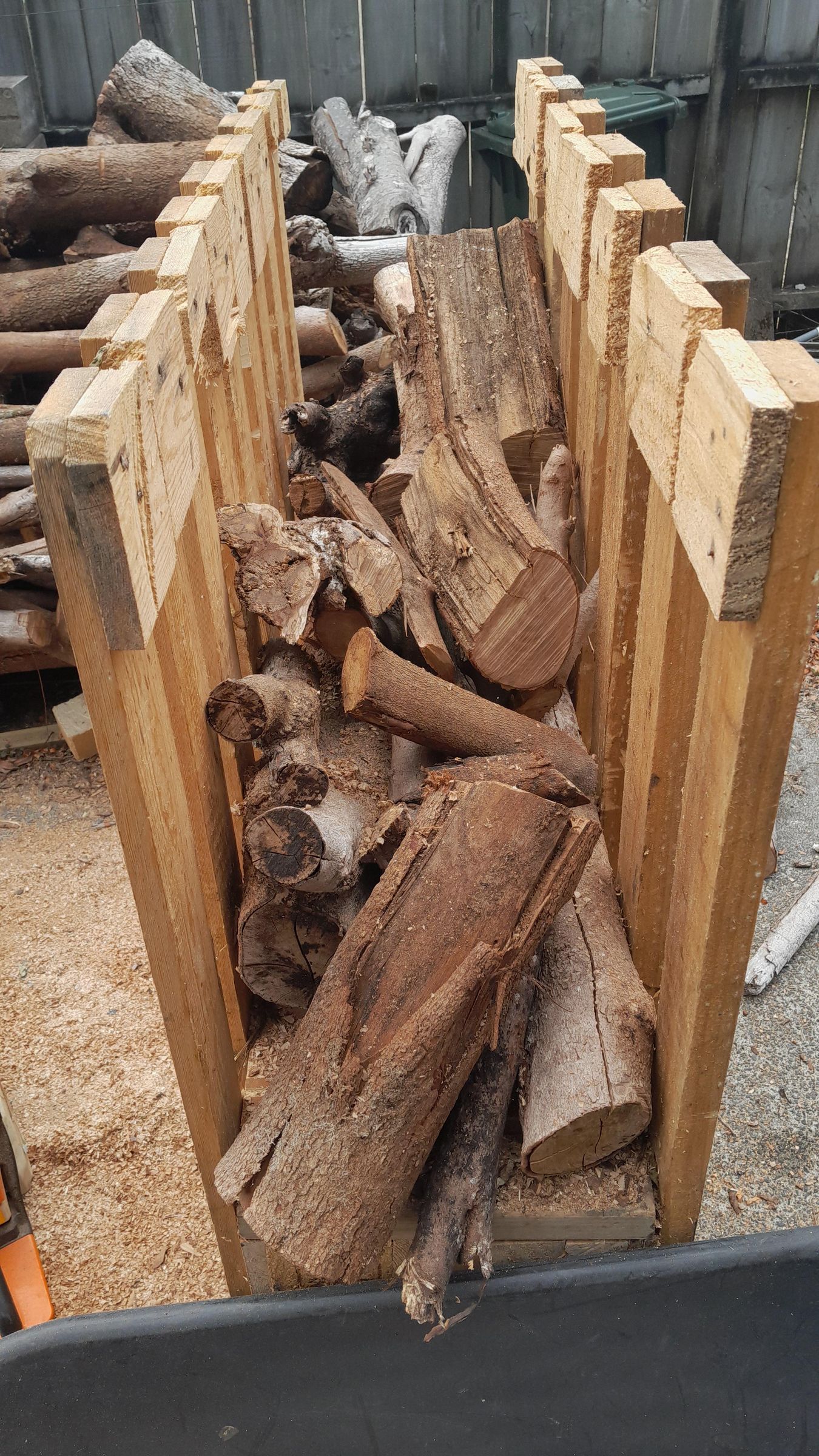 DIY Pallet and Chainsaw Mulching Rack for Easy Vegetation Shredding