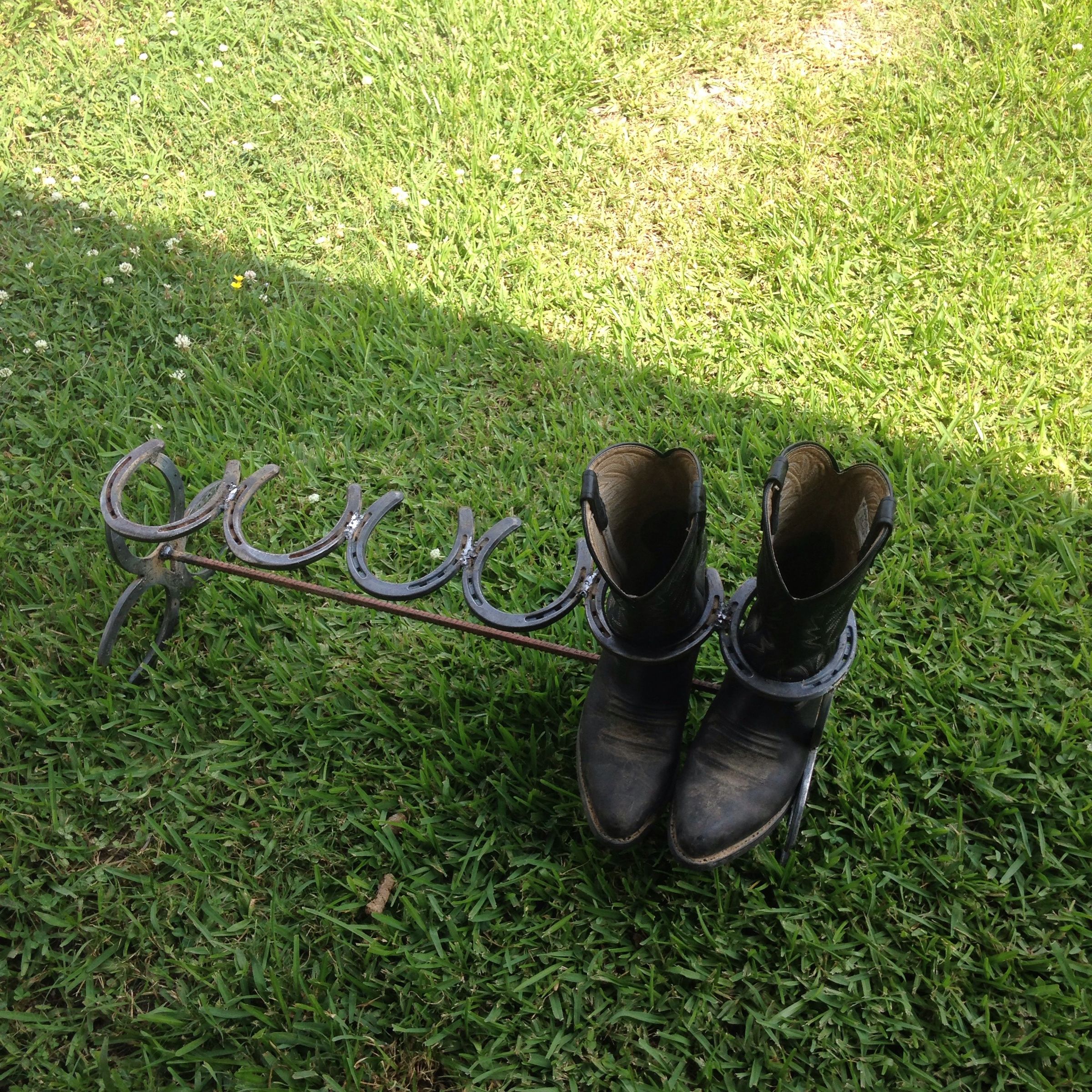 boot rack made out of horseshoes