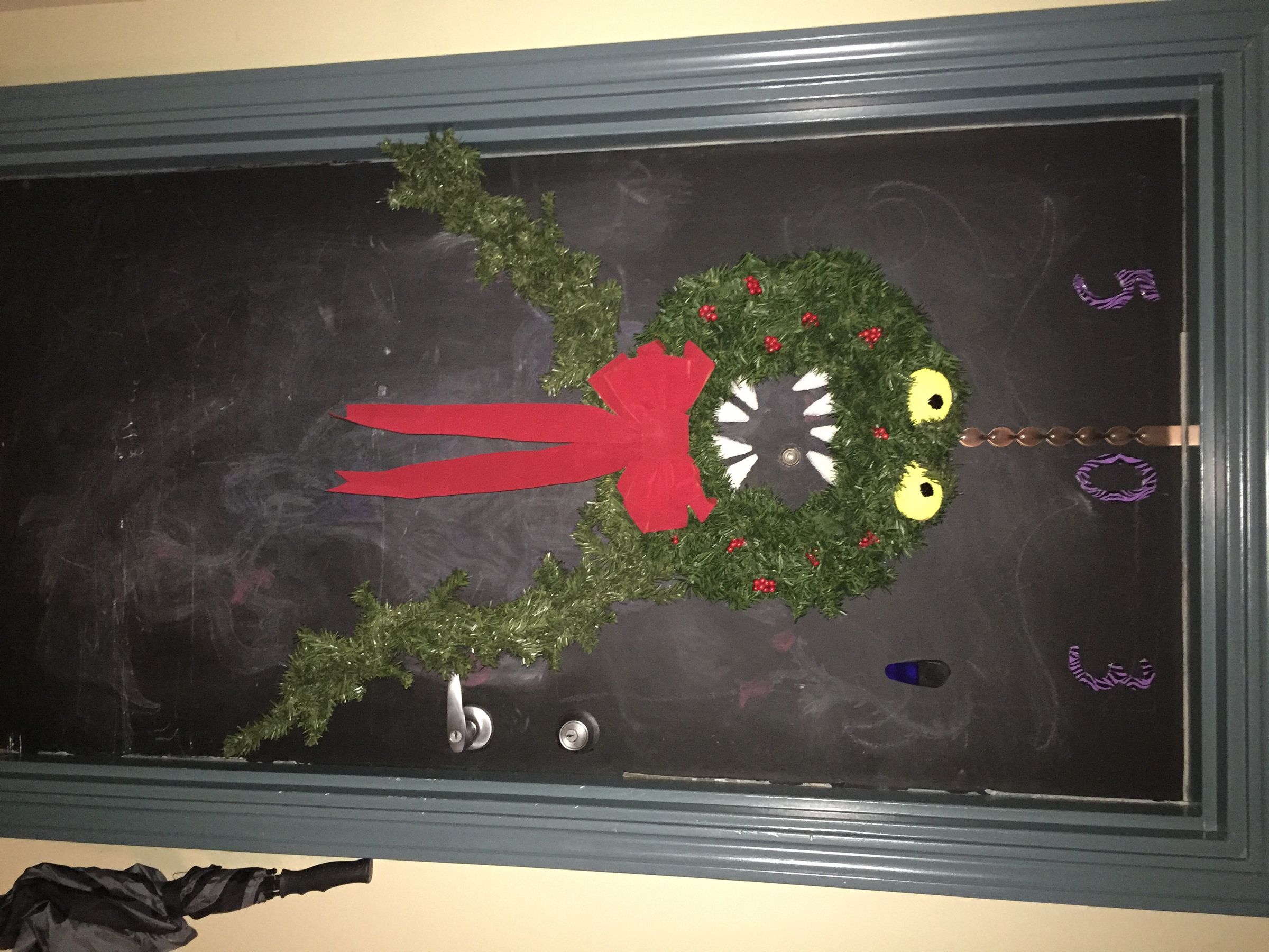 Christmas or Halloween? the Man Eating Wreath.