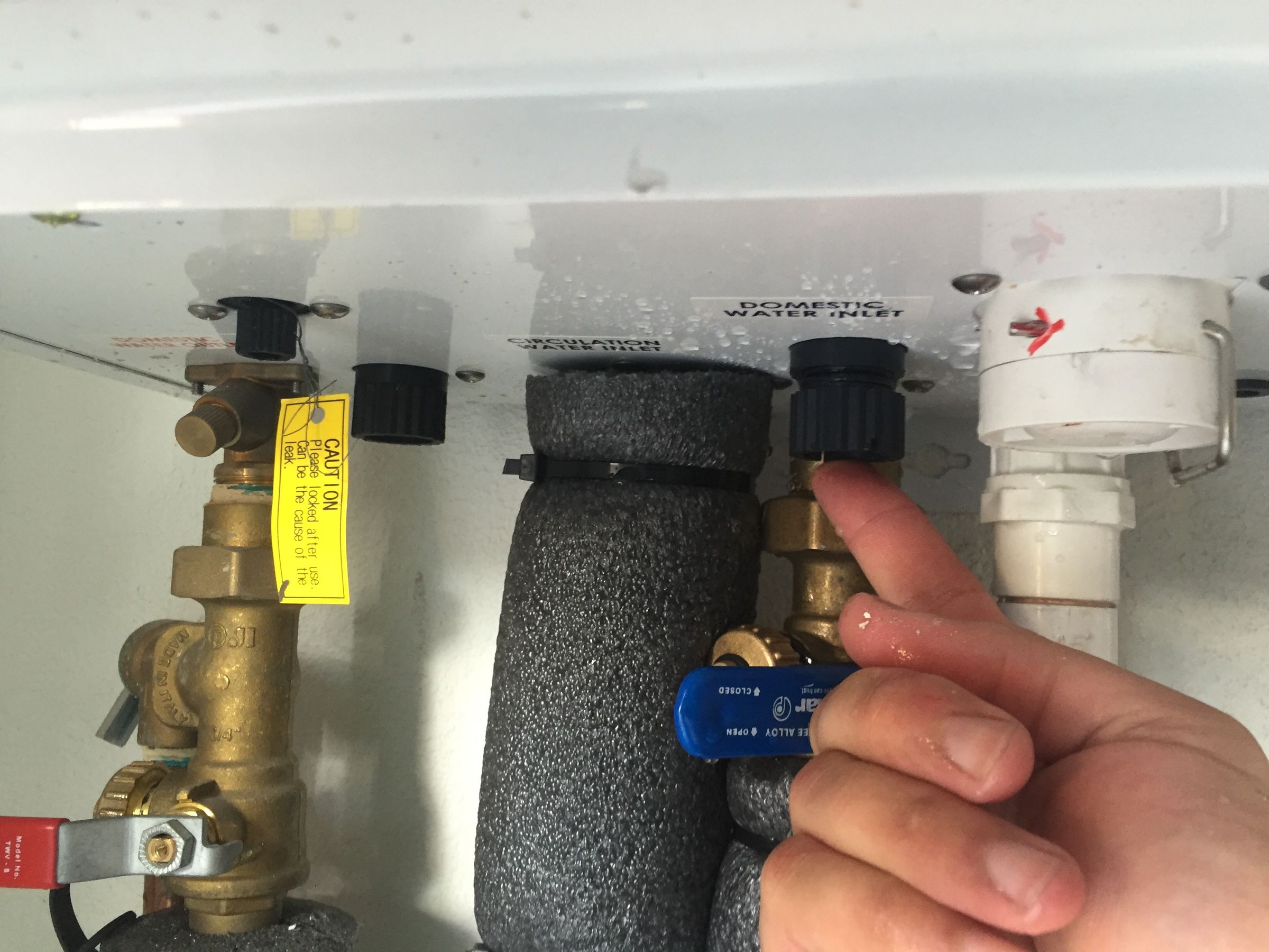How to Flush a Tankless Water Heater and Clean the Air Intake Filter