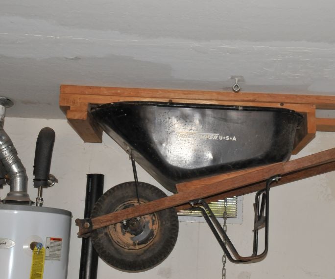 Hang Your Wheelbarrow On The Wall Or From The Ceiling 7 Steps With Pictures Instructables