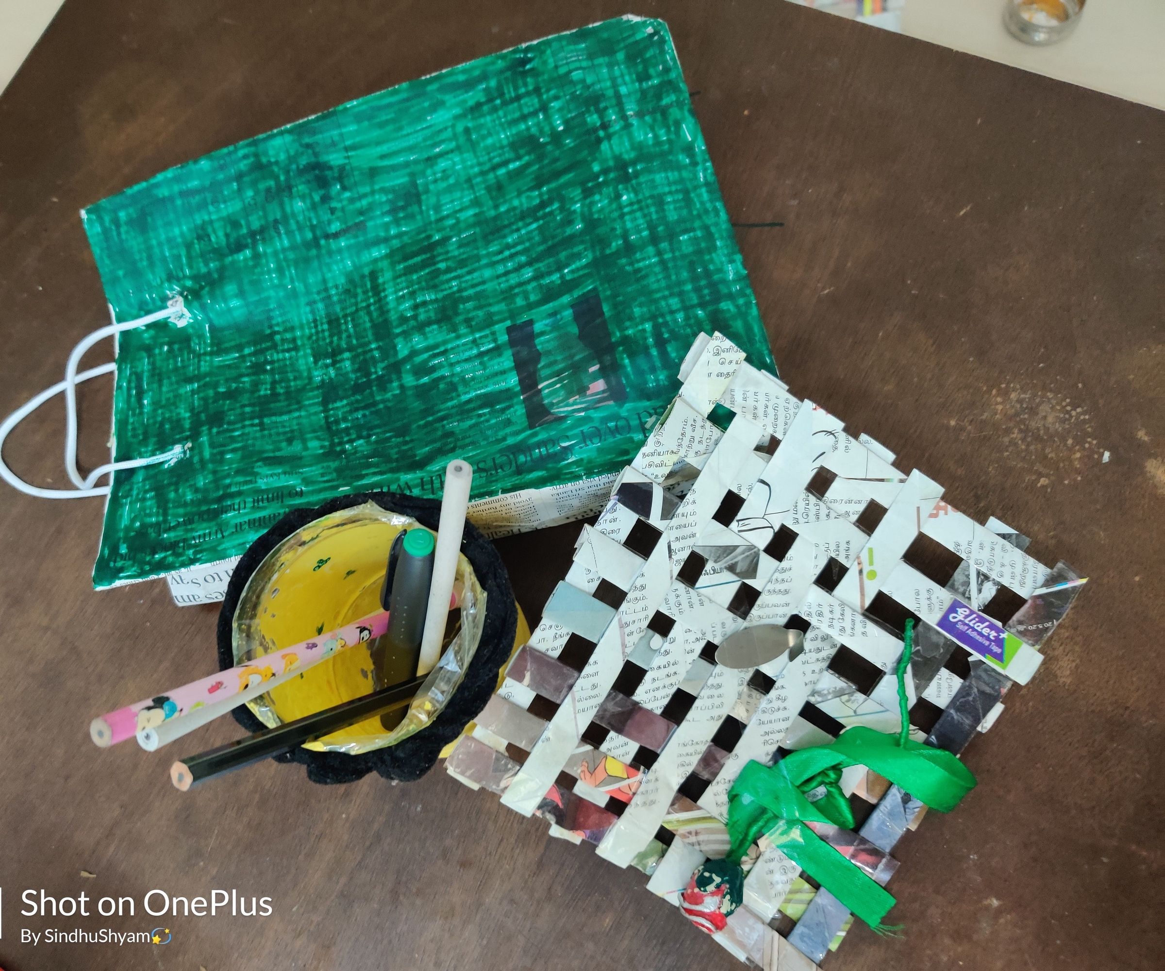 attractive materials made from reusable(plastic and newspaper) using "home made glue" and tape DIY Project DIY Project Image