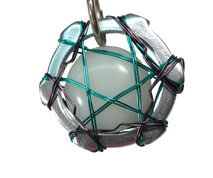 DIY guide for "Hardware Store Jewelry" Wire Wrapped Spiral Pendant Tutorial with step-by-step instructions