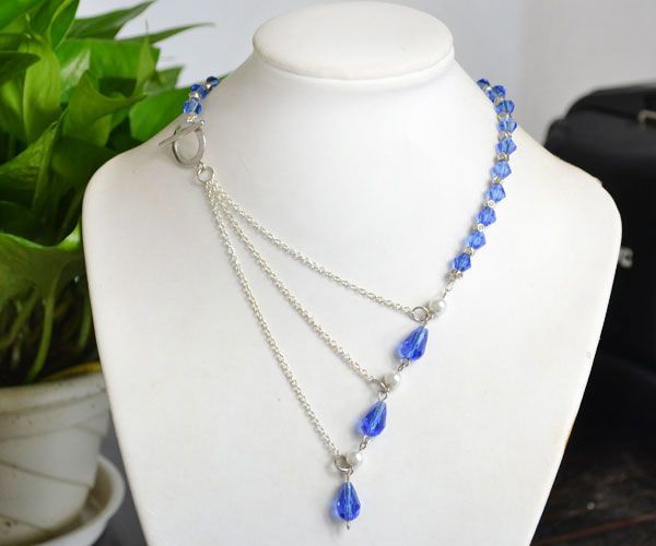 DIY guide for How to Make an Ocean Style Chain Link Necklace with Crystal Beads with step-by-step instructions