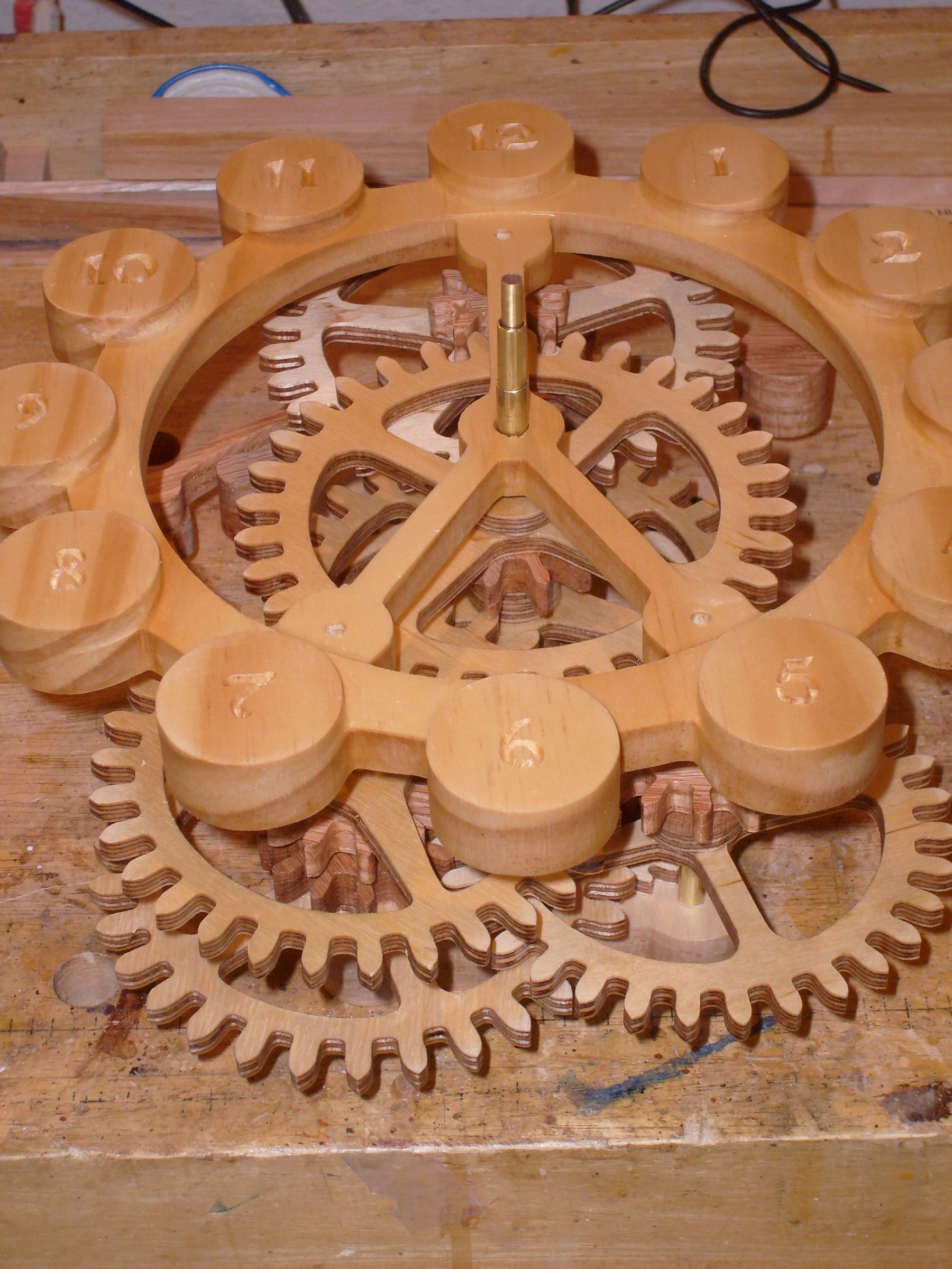 A Wood Gear Clock With a Unique Drive Mechanism 34 Steps (with