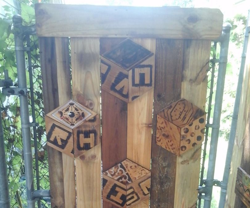 DIY guide for Add more privacy to chain-link fence with wood art with step-by-step instructions