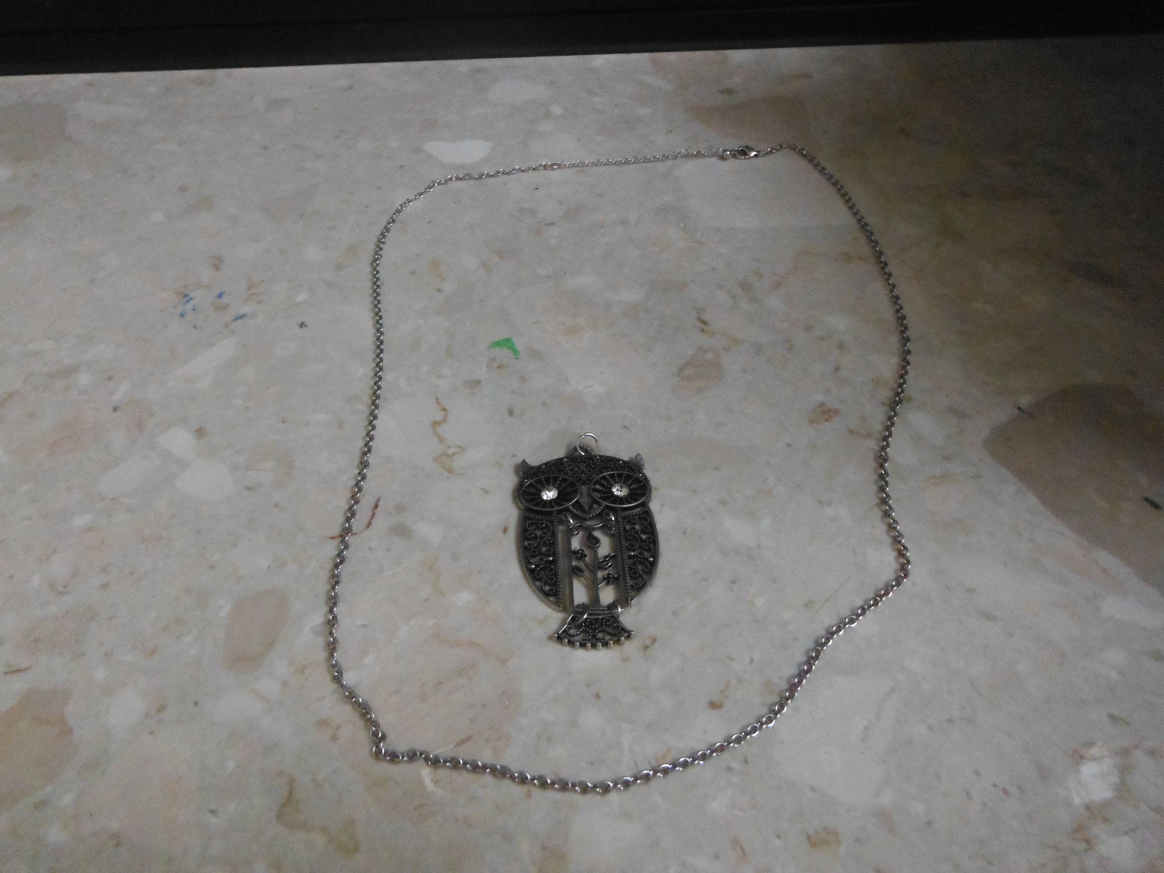 Make a Bottle Cap Necklace 7 Steps Instructables