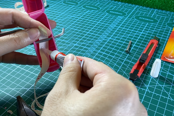 Rolling the Sewing Ruler in to the Box