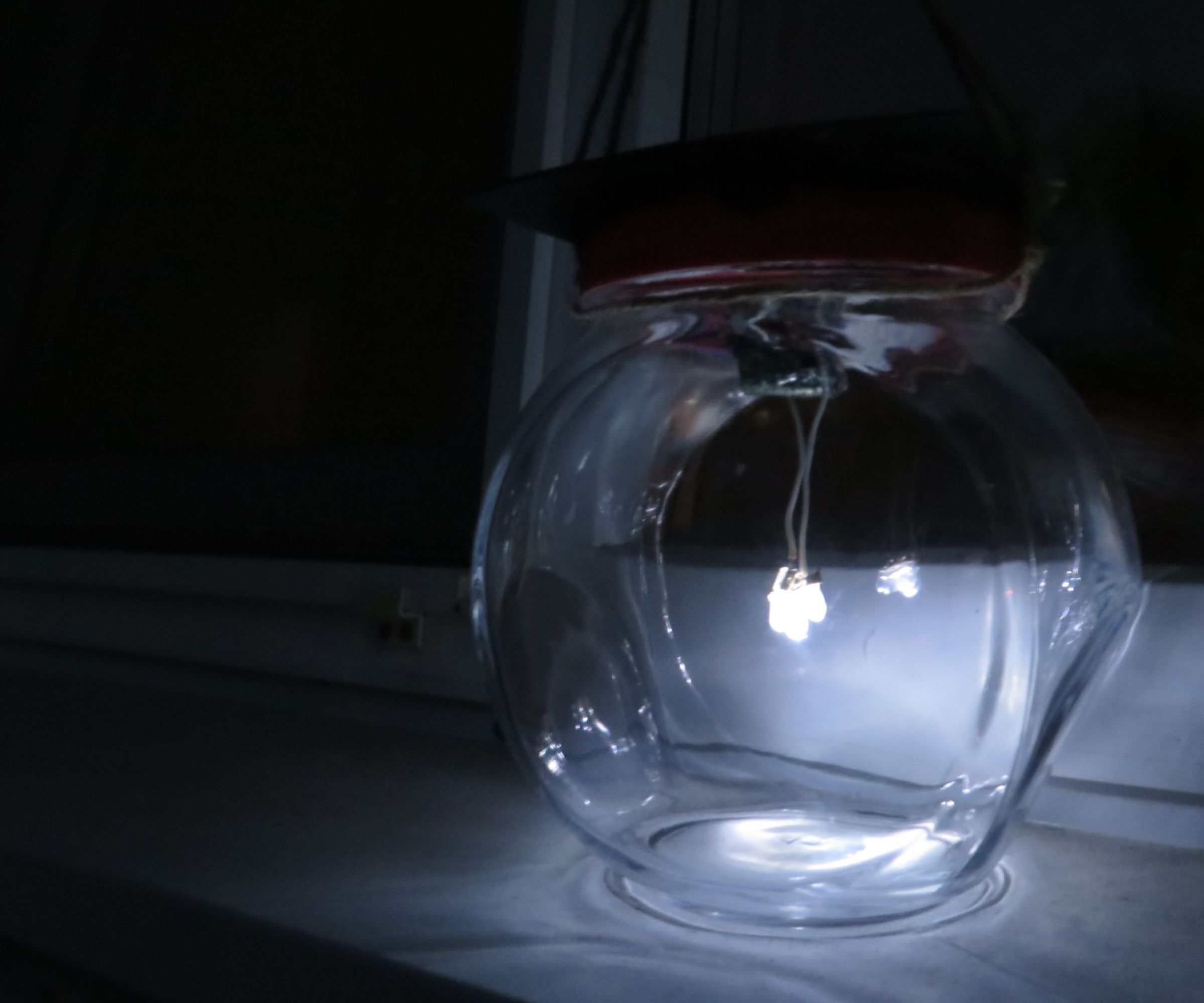 DIY guide for Nocturnal Solar-powered Lamp From a Mason Jar with step-by-step instructions