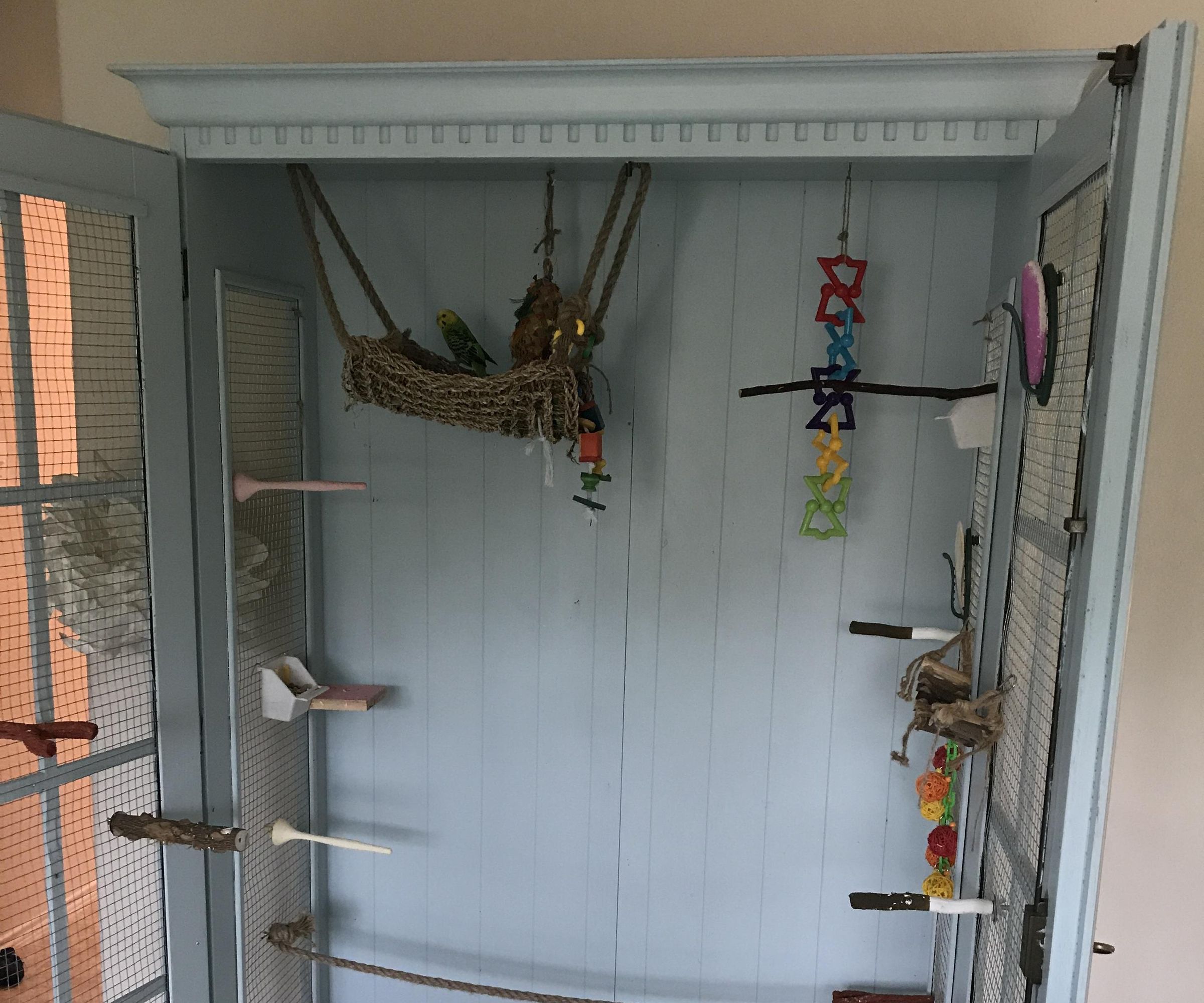 Turn a China Cabinet Into a Deluxe Bird Cage