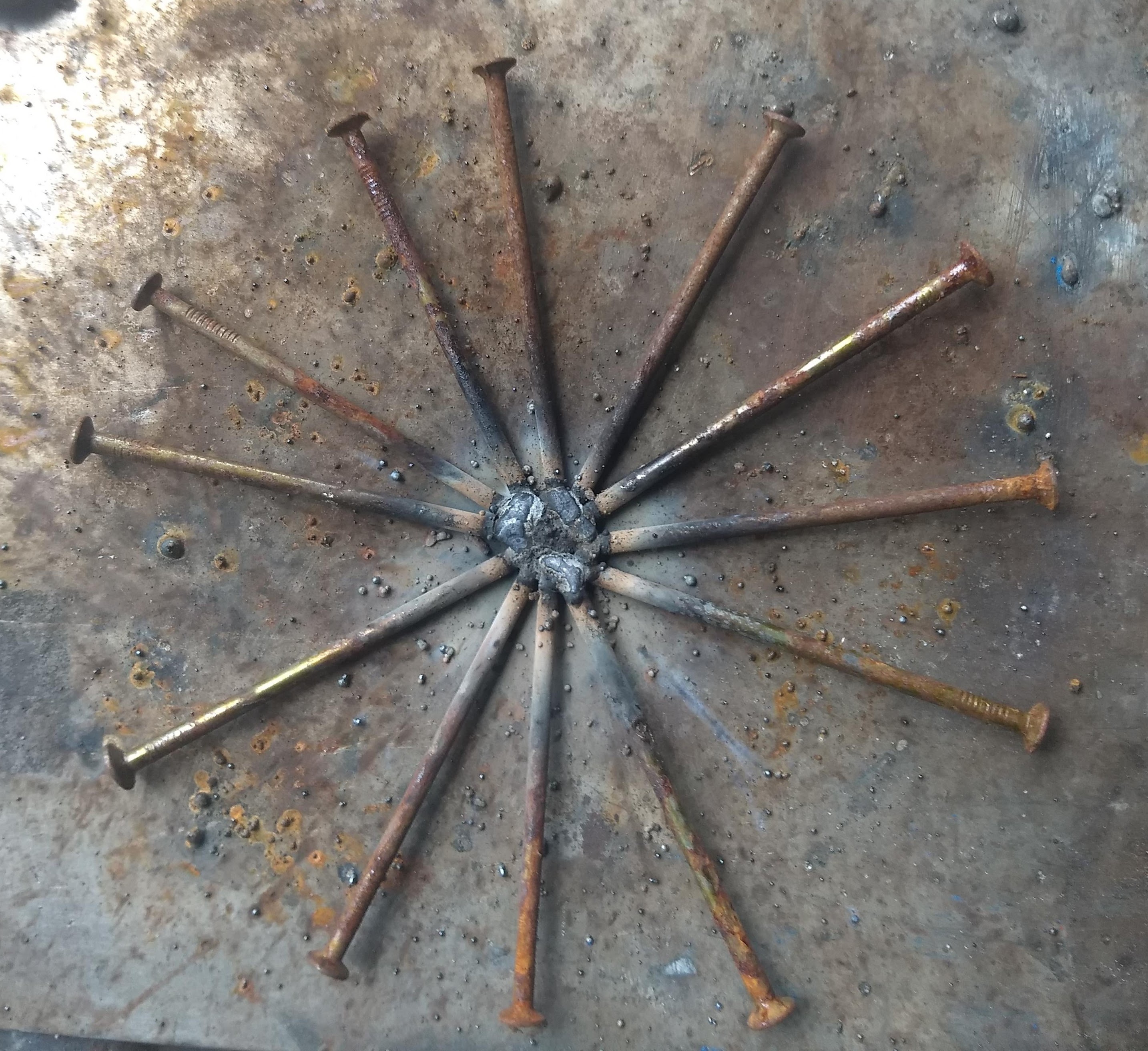 Flower Made of Scrap Nails 5 Steps Instructables