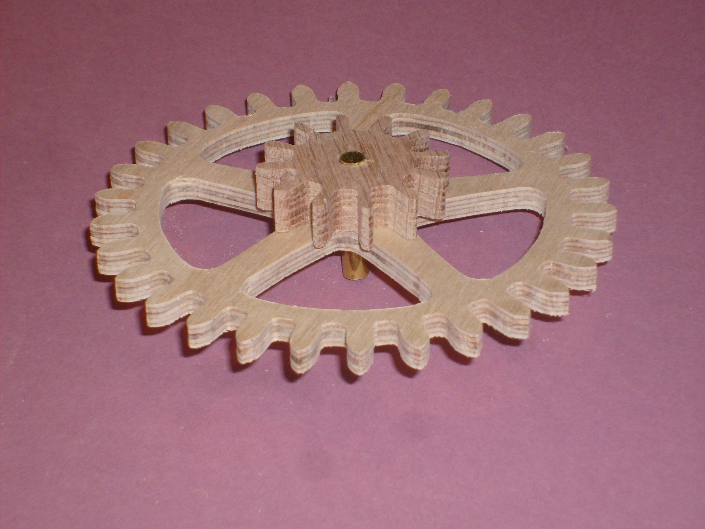 A Wood Gear Clock With a Unique Drive Mechanism 34 Steps (with