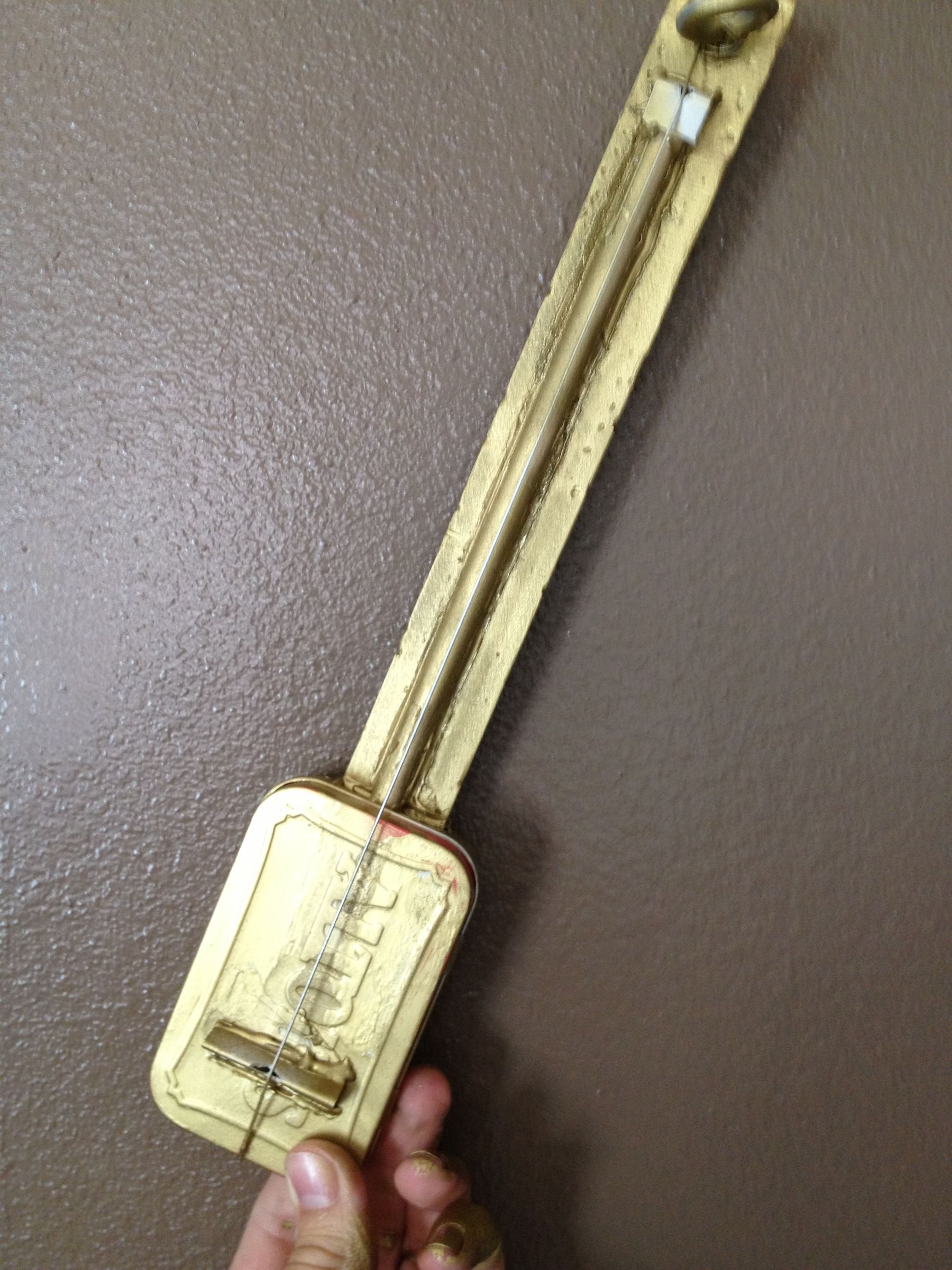 DIY guide for One String Altoids Guitar with step-by-step instructions