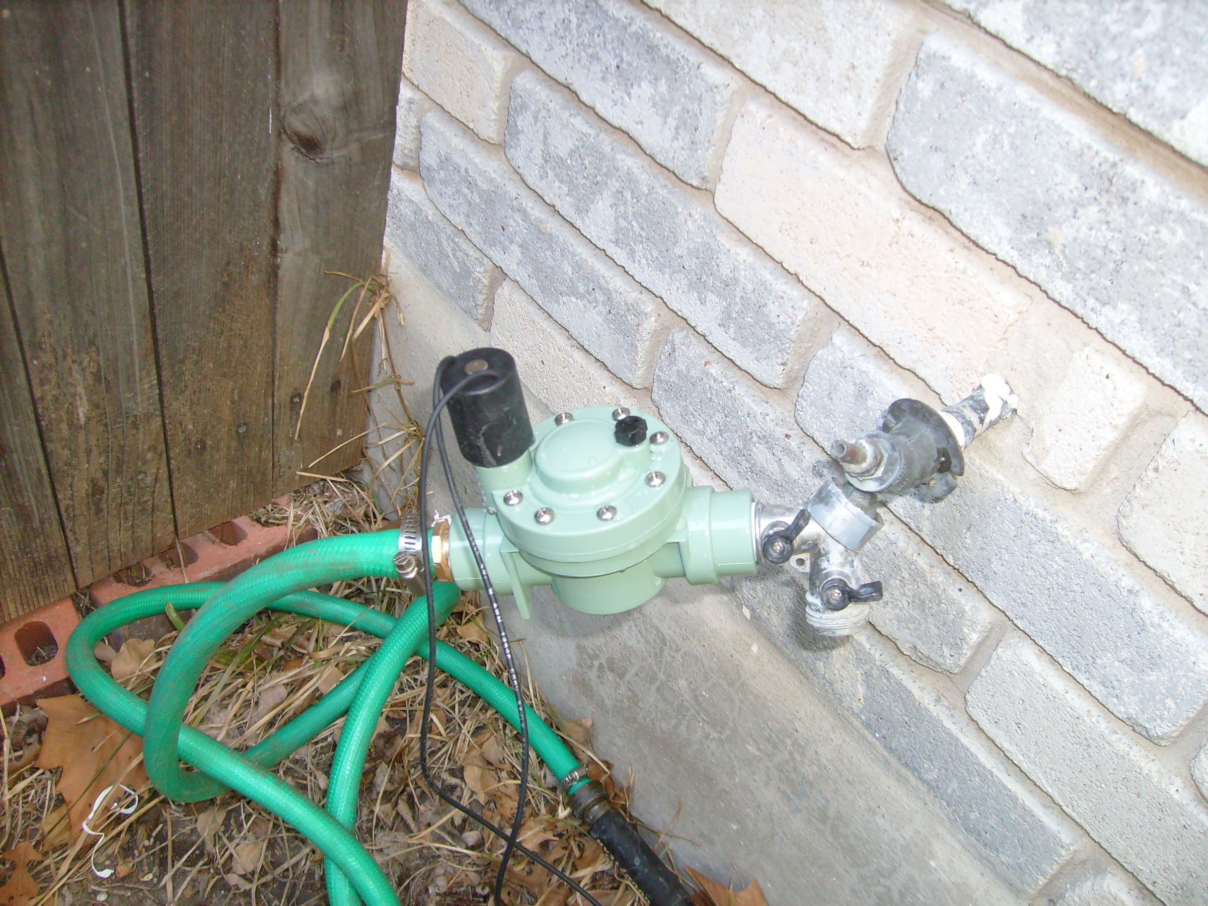 DIY guide for Poor-mans automatic sprinkler. with step-by-step instructions