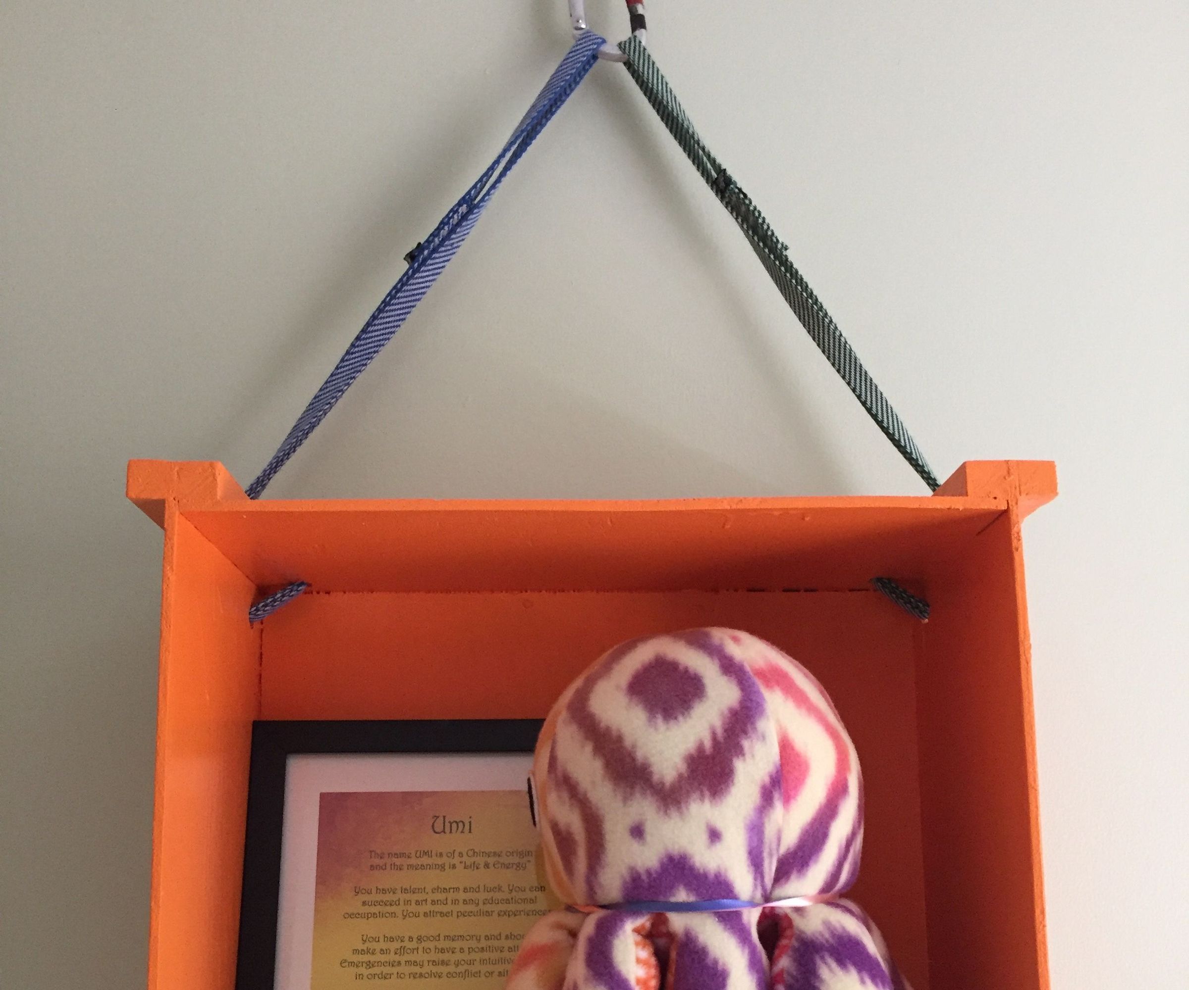 DIY guide for Hanging Shelves From Boxes with step-by-step instructions