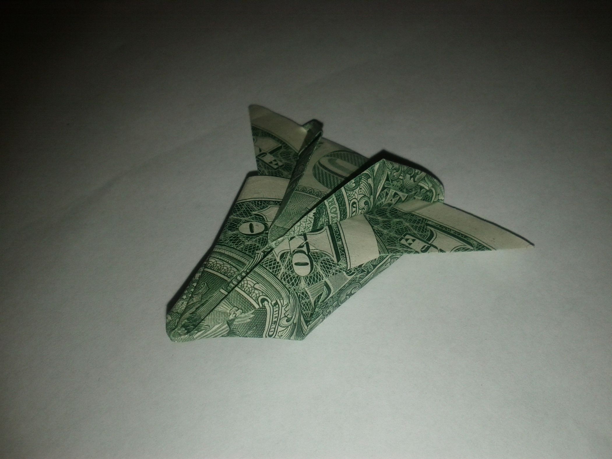 Dollar Airplane Oragami 13 Steps Instructables