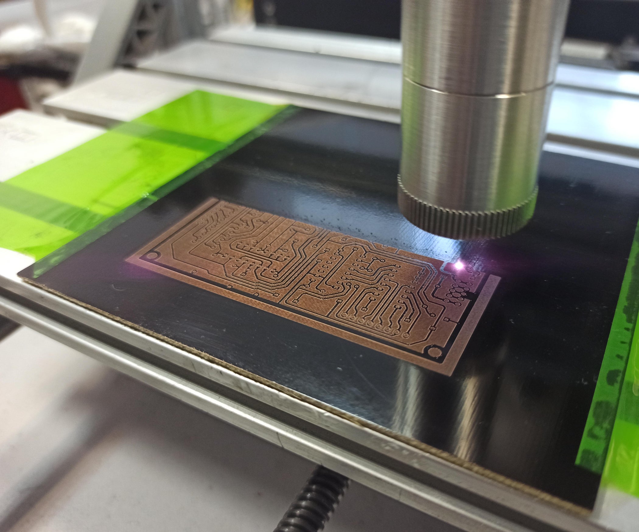 Experiment on Engraving Conductive Tracks on a Copper Foil Coated