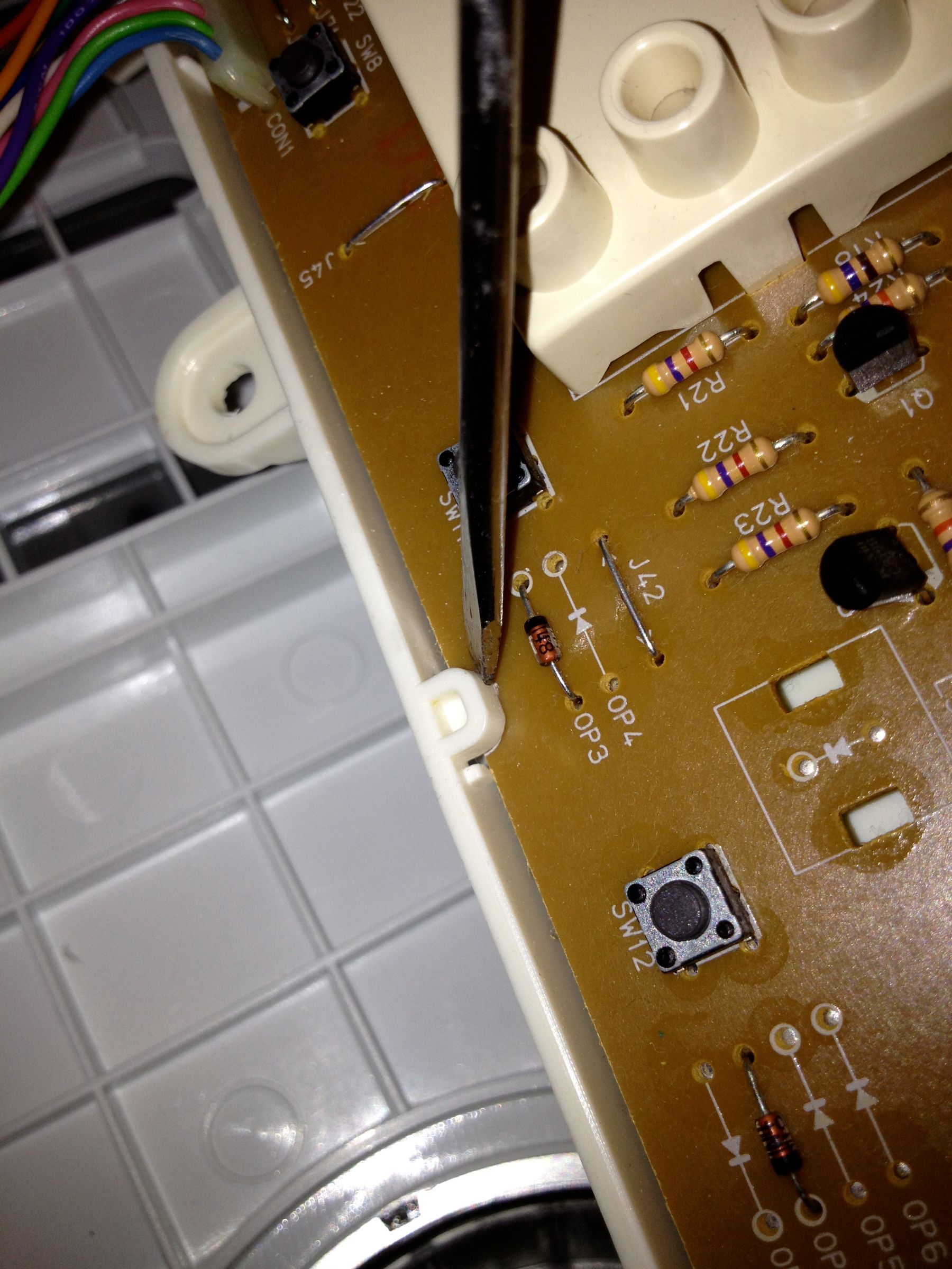 Replacing the User Interface Control Board on a LG Washing Machine. 8