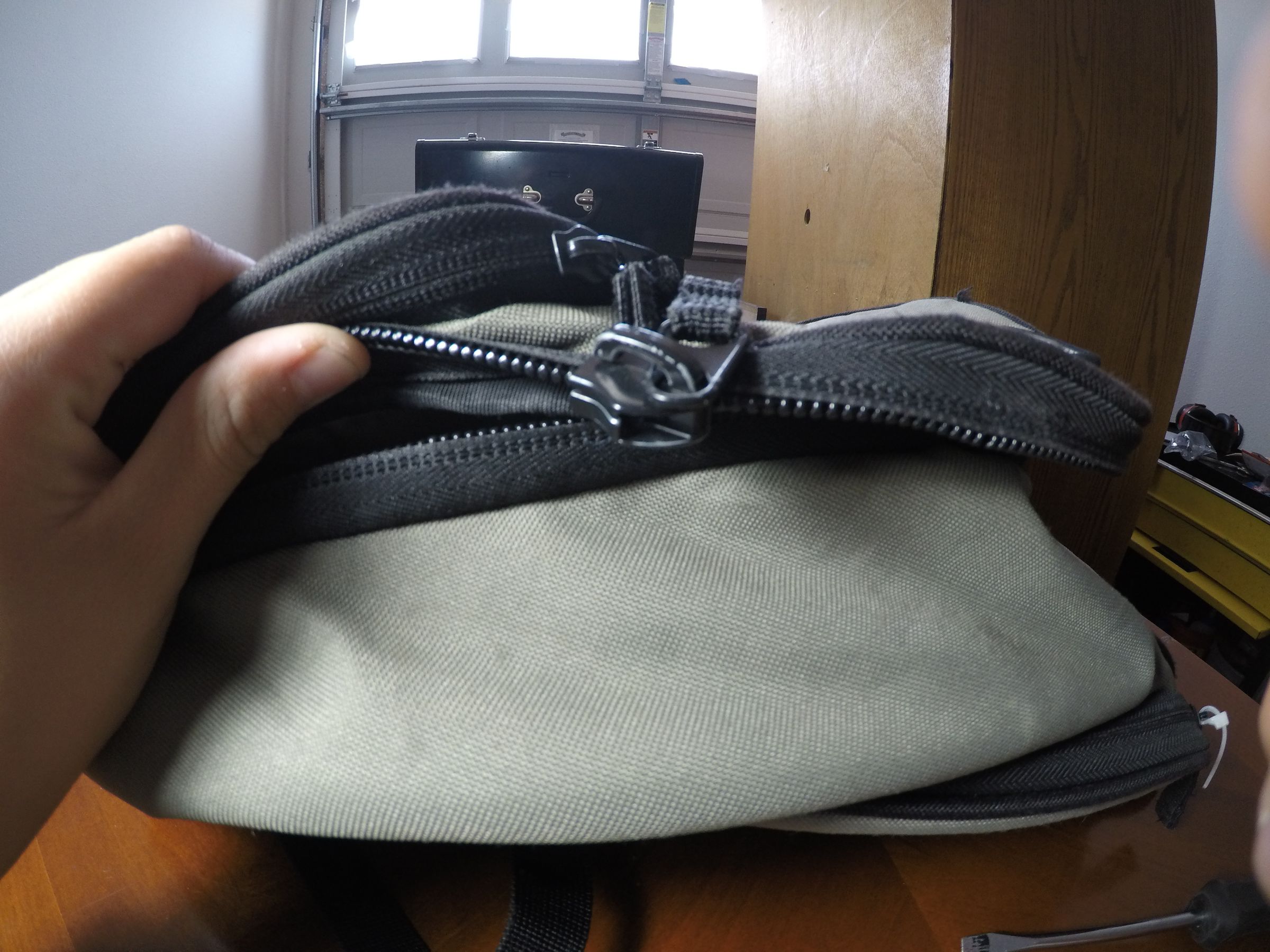 backpack with zipper on back