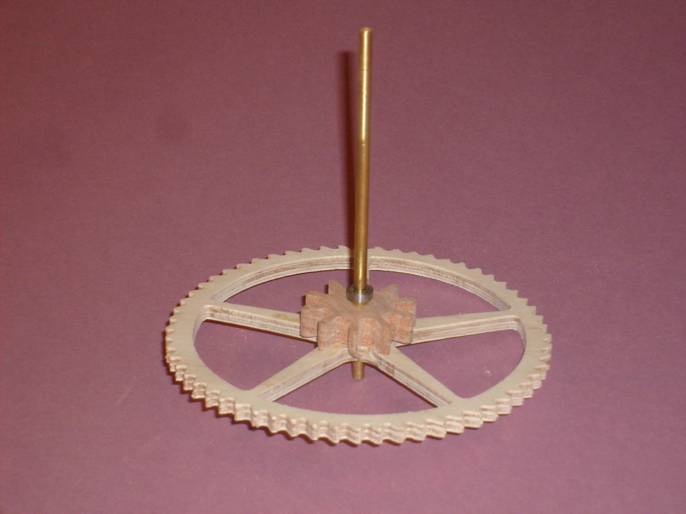 A Wood Gear Clock With a Unique Drive Mechanism 34 Steps (with