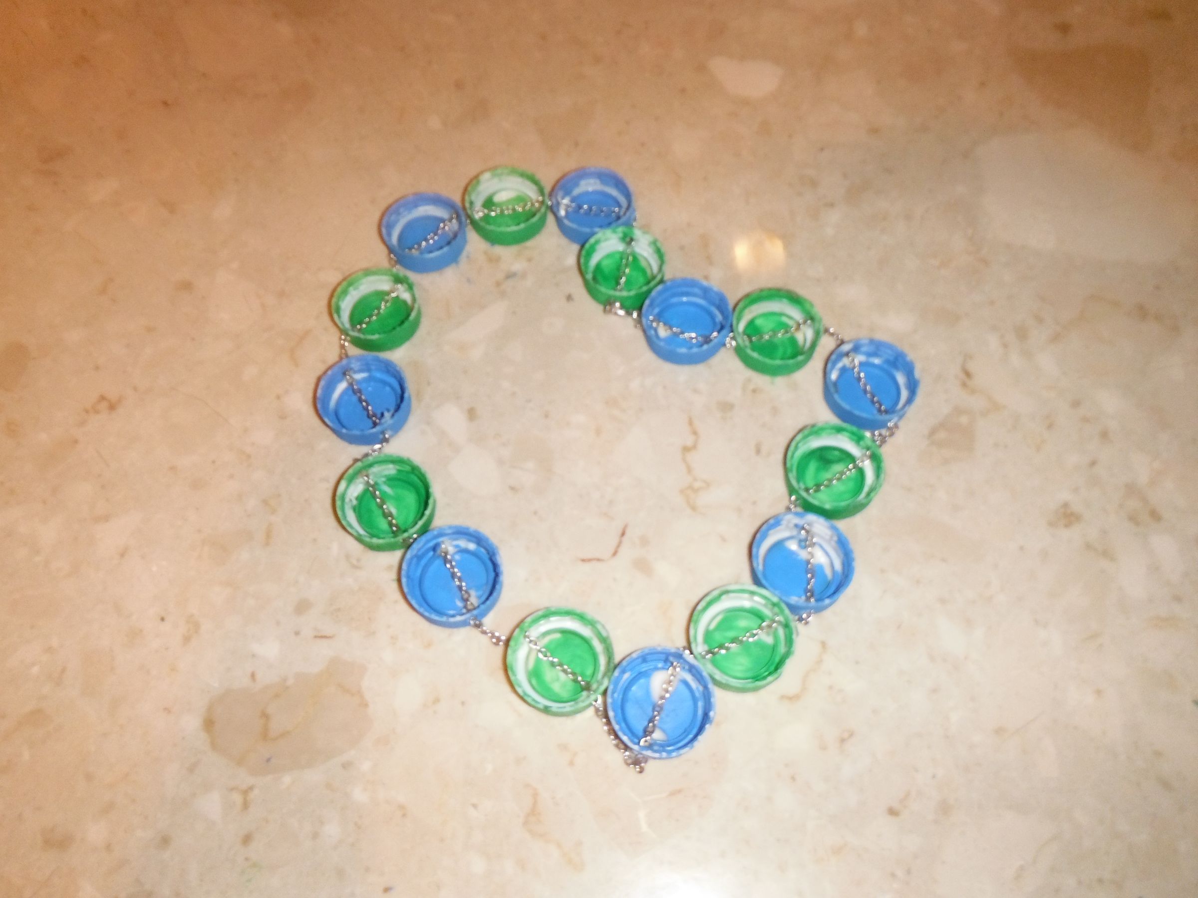 Make a Bottle Cap Necklace 7 Steps Instructables